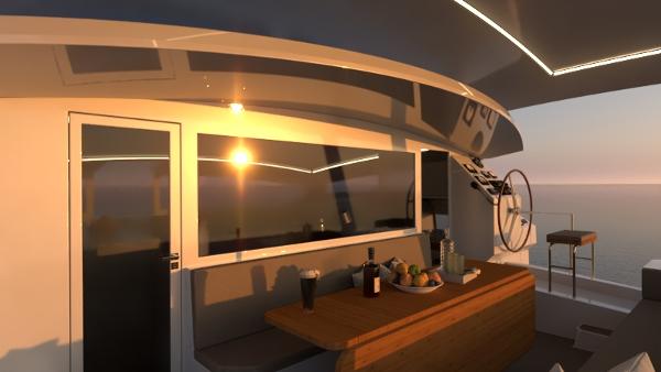 2024 Catamaran Cruisers Power Cat interior at sunset with dining area and helm.