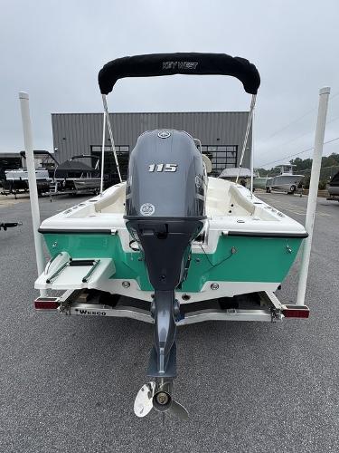 2025 Key West 179 FS boat with 115 HP outboard motor, rear view.