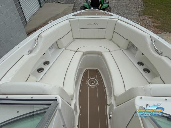 2008 Sea Ray 270 SLX boat with spacious white seating and sleek design.