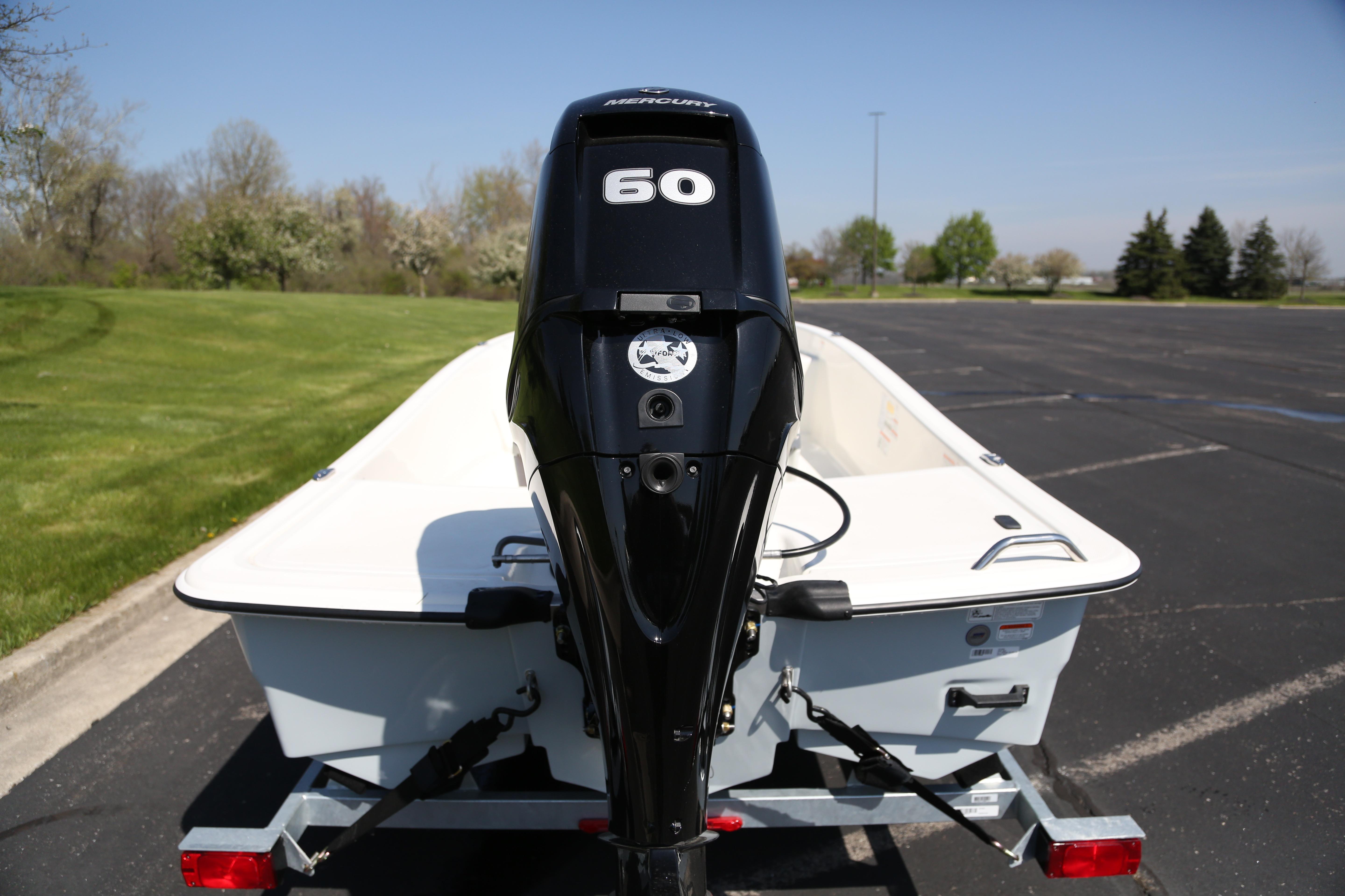 2026 Mako Pro Skiff 15 CC with Mercury 60 engine on a trailer.
