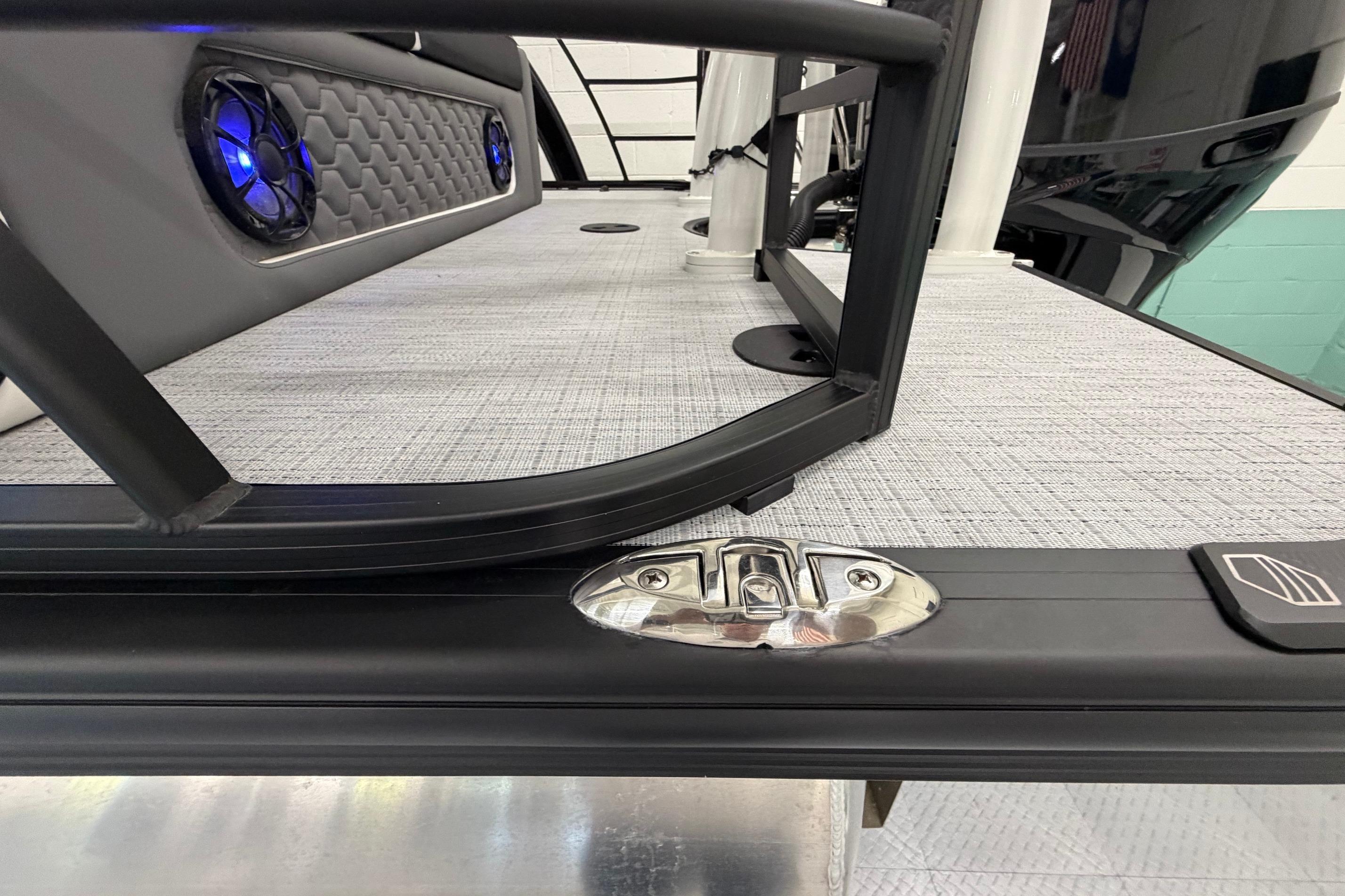 2026 South Bay 525SB2 boat deck with sleek design and blue LED speakers.