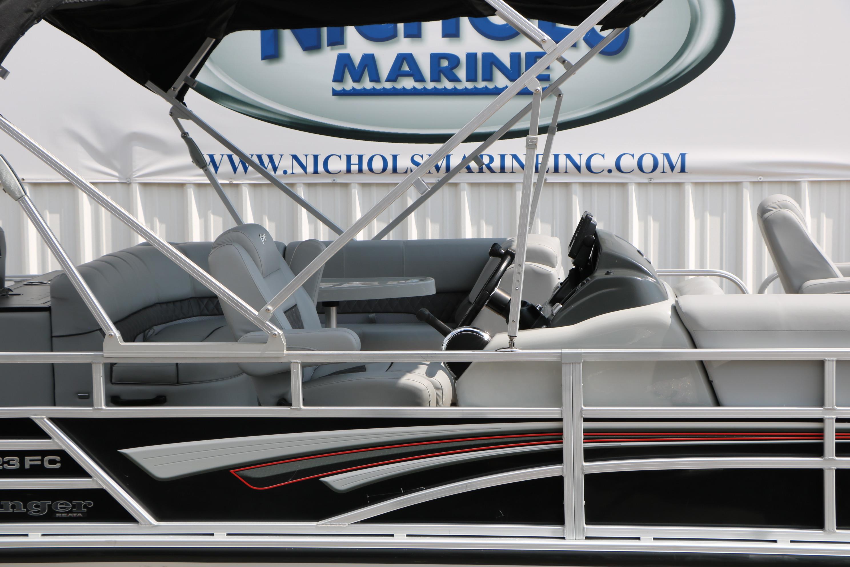 2021 Ranger 223FC pontoon boat with sleek design and comfortable seating.