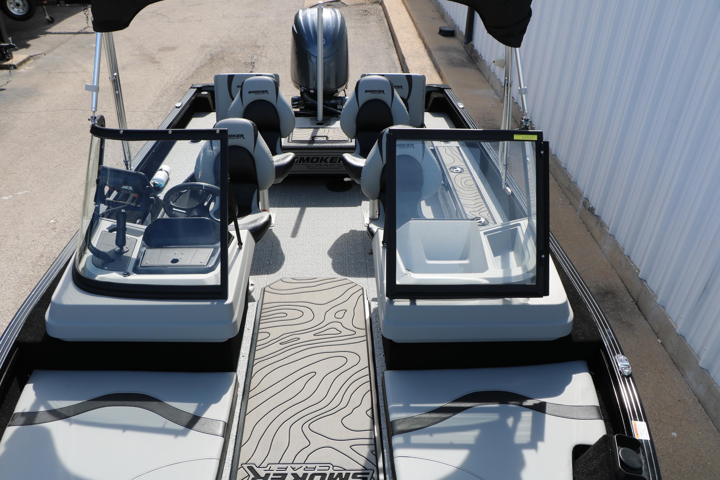 2025 Smoker Craft Adventurer 188 DC boat interior with dual consoles and seating.