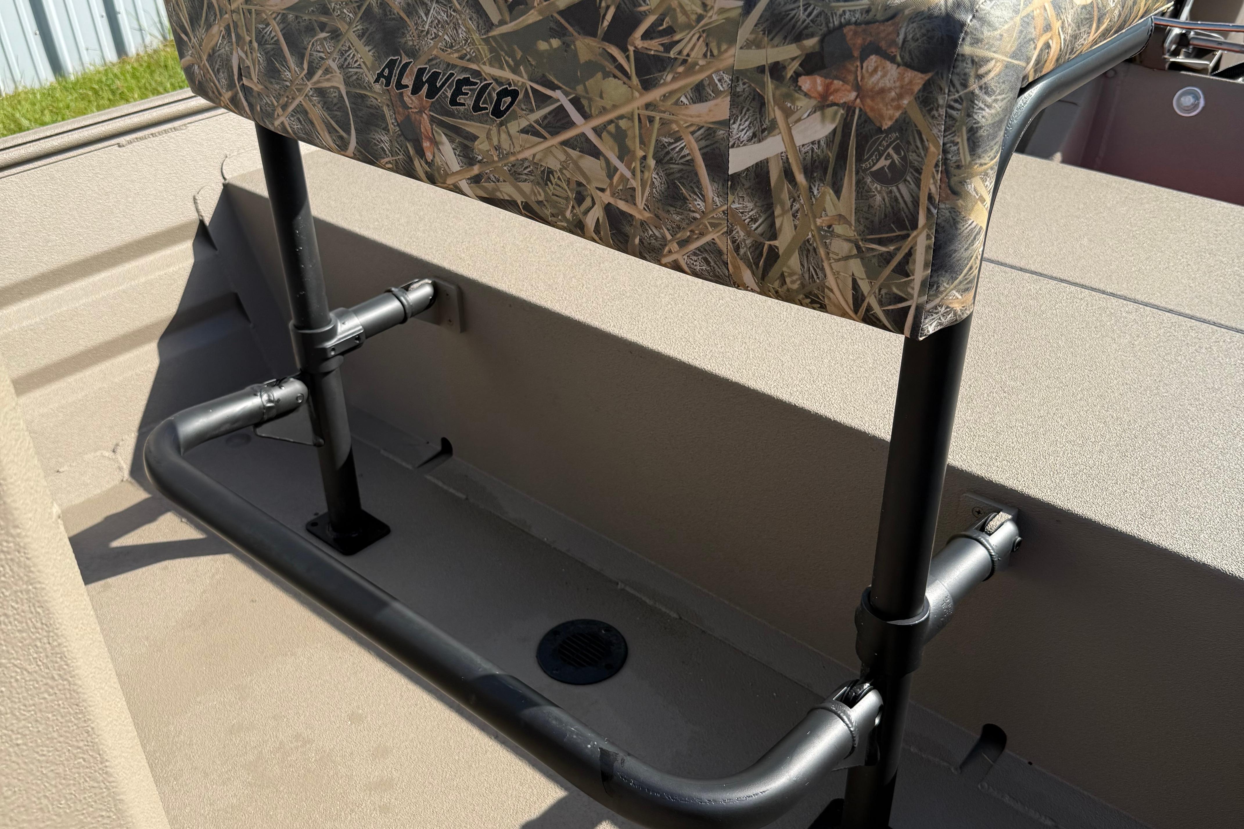 2025 Alweld 1756 V MARSH C.C. boat seat with camouflage design and sturdy frame.