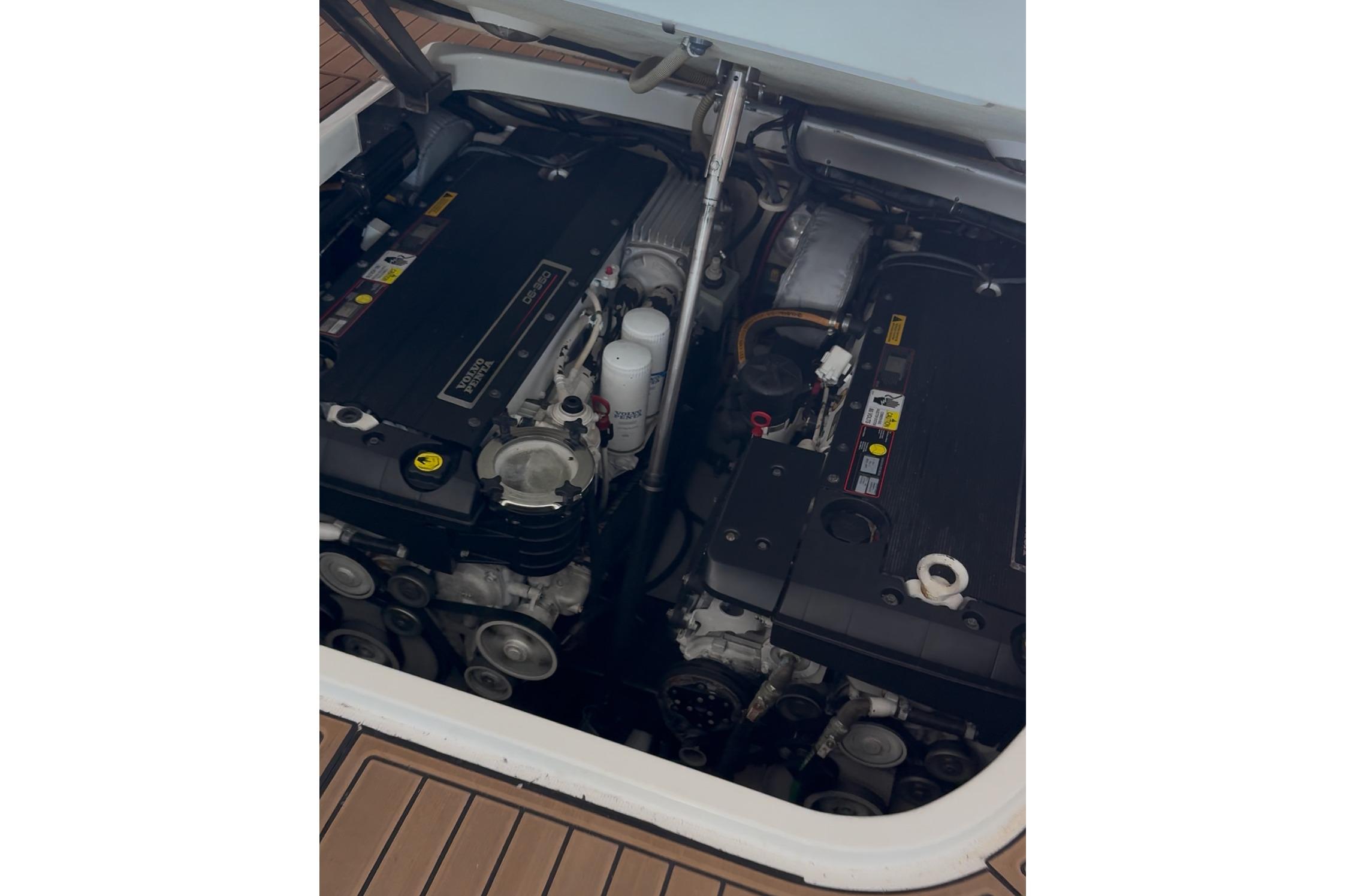 Engine compartment of a 2008 Formula 400 Super Sport boat, showcasing dual engines.