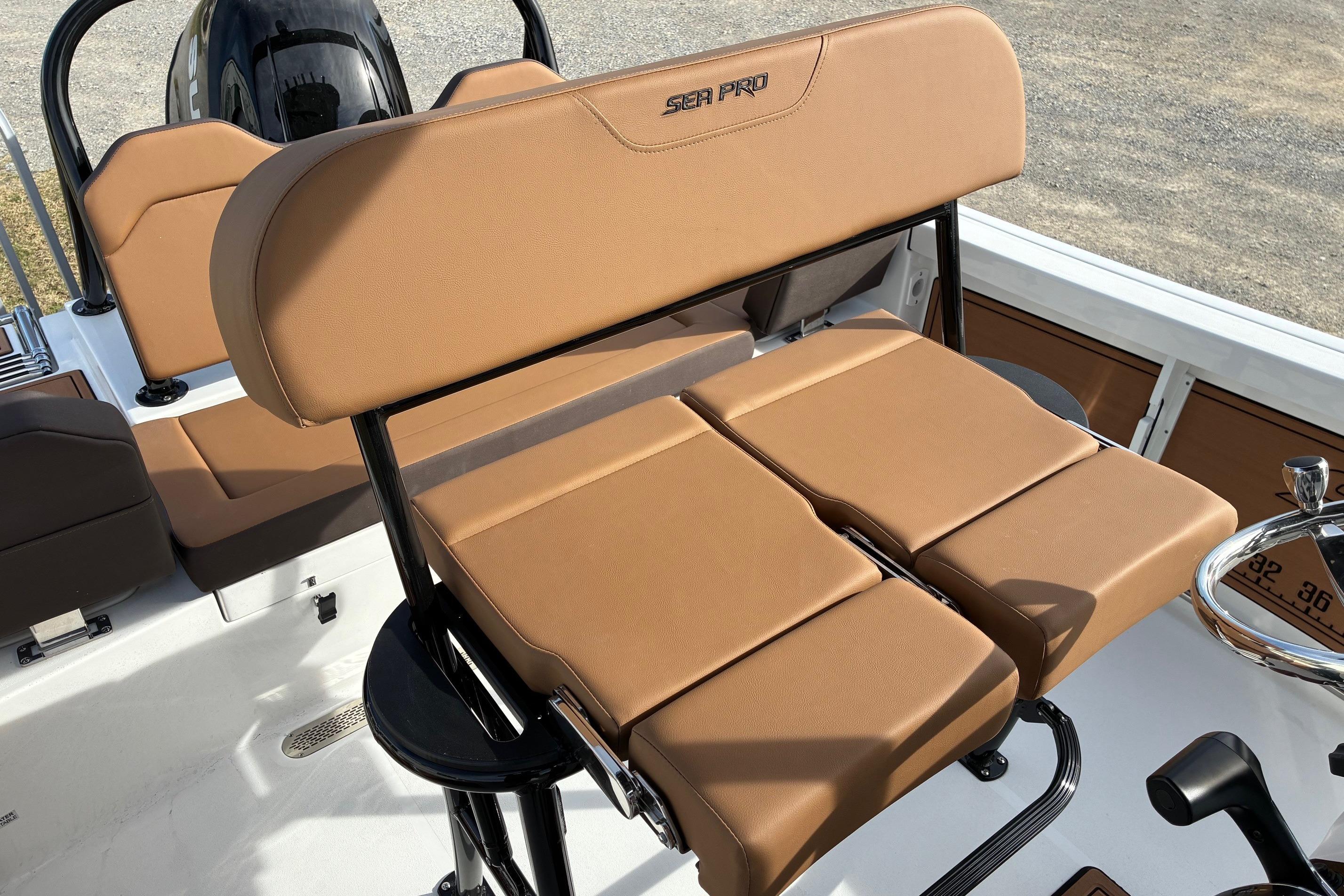 2026 Sea Pro 225FLX Sandbar boat with tan seating and sleek design.