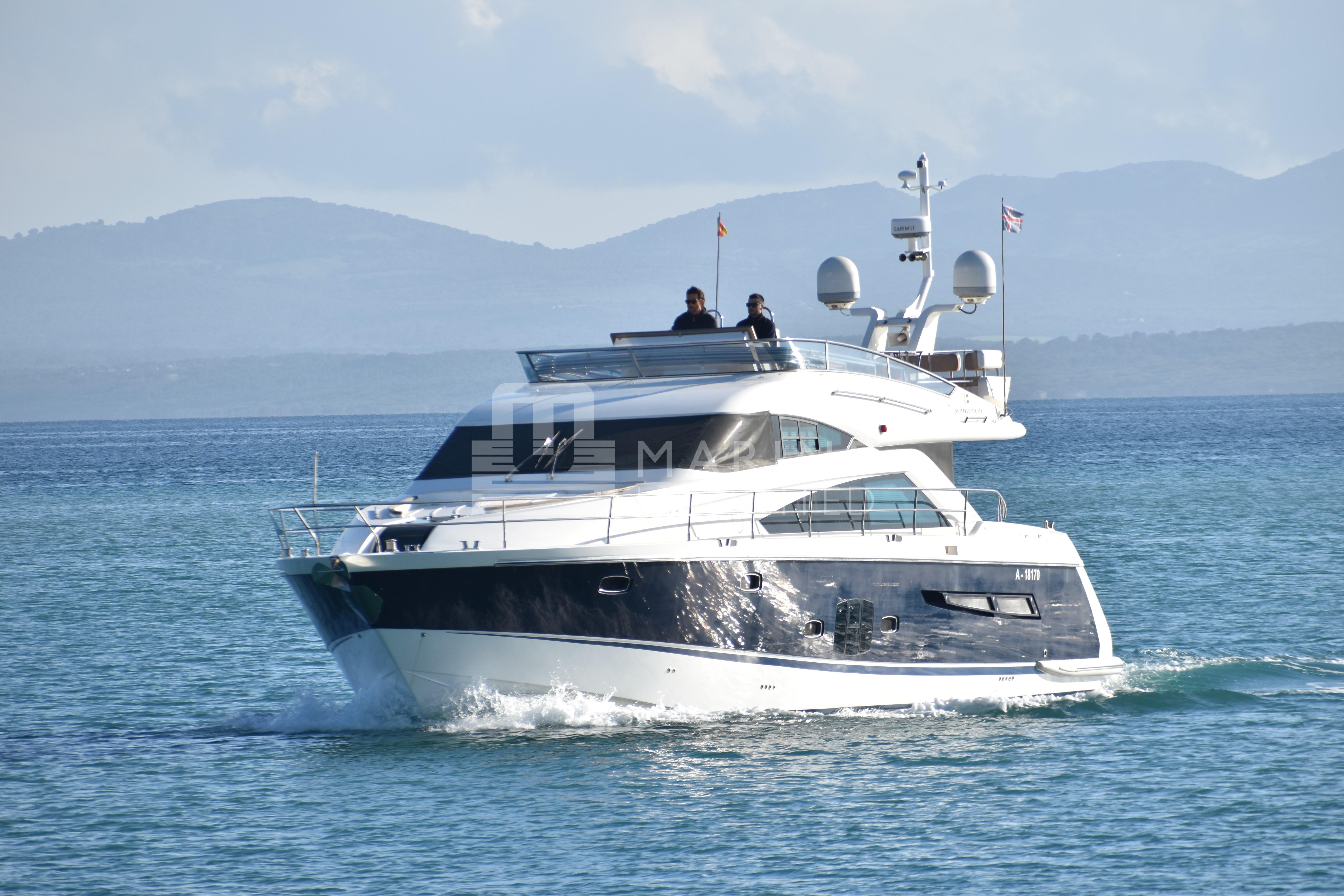 Luxury 2010 Fairline Squadron 55 yacht cruising on open water.