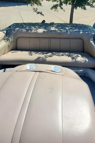 2000 Calabria Sport Comp XTS boat interior with beige leather seating.