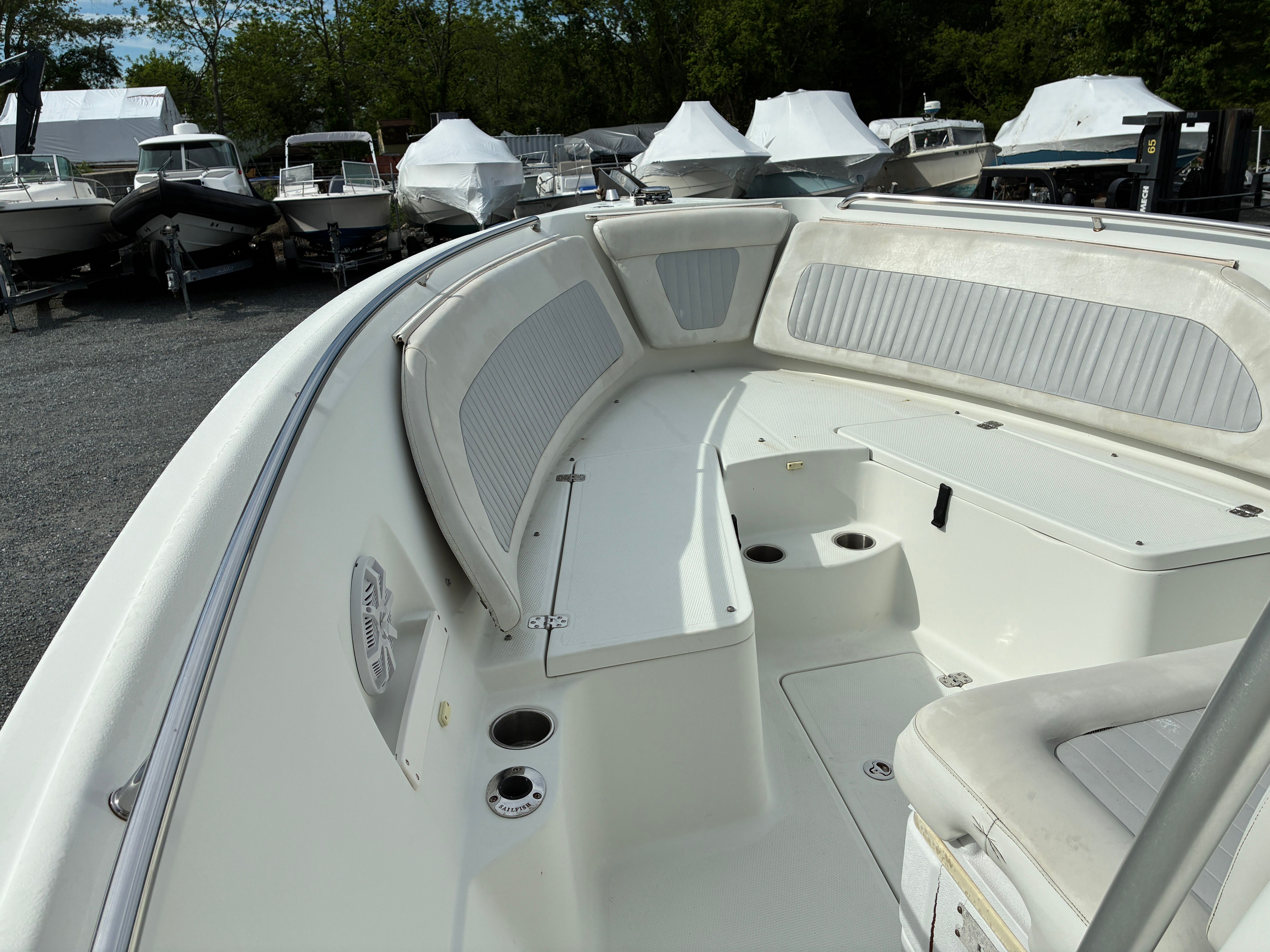 Interior view of a 2007 Sailfish 2660 boat in the marina.