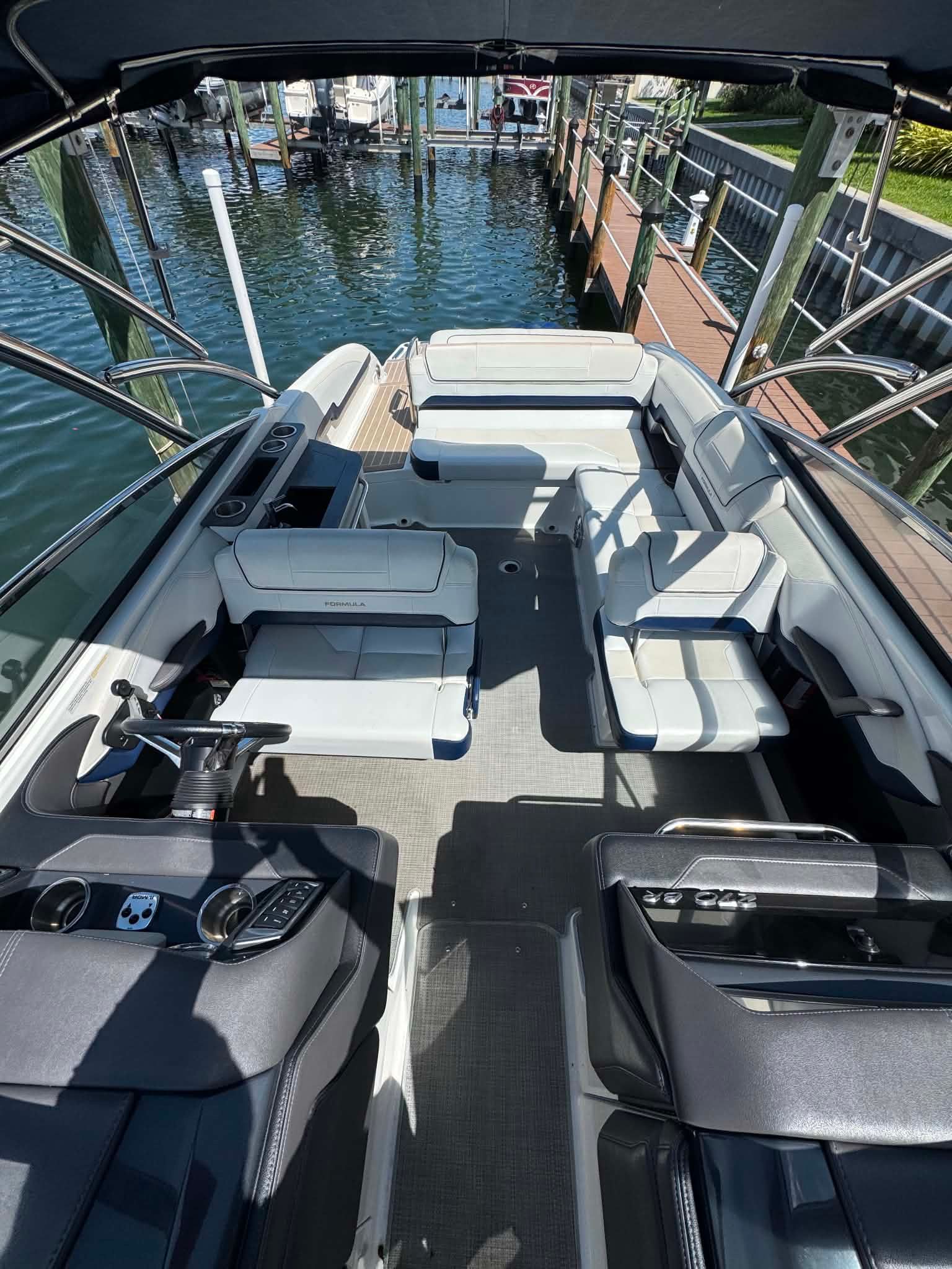 Interior view of a 2018 Formula 270 Bowrider boat at the dock.
