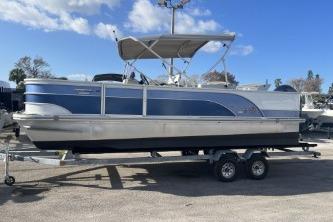 2023 Suntracker G3 Select 322 CC pontoon boat on trailer, blue and silver design.