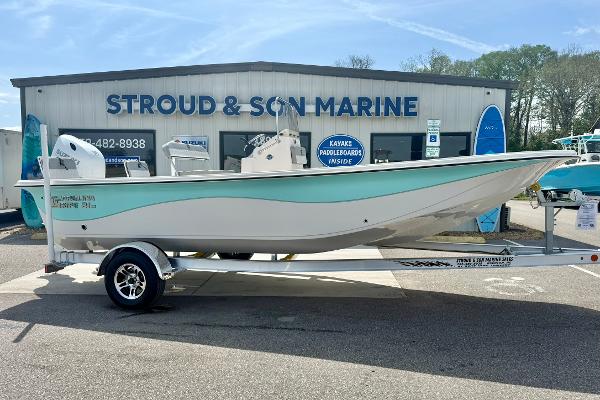 2025 Carolina Skiff 21 LS boat on trailer at Stroud & Son Marine dealership.