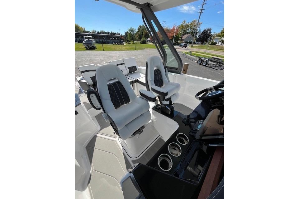 2026 Monterey Elite 27 SD boat interior with modern seating and dashboard.