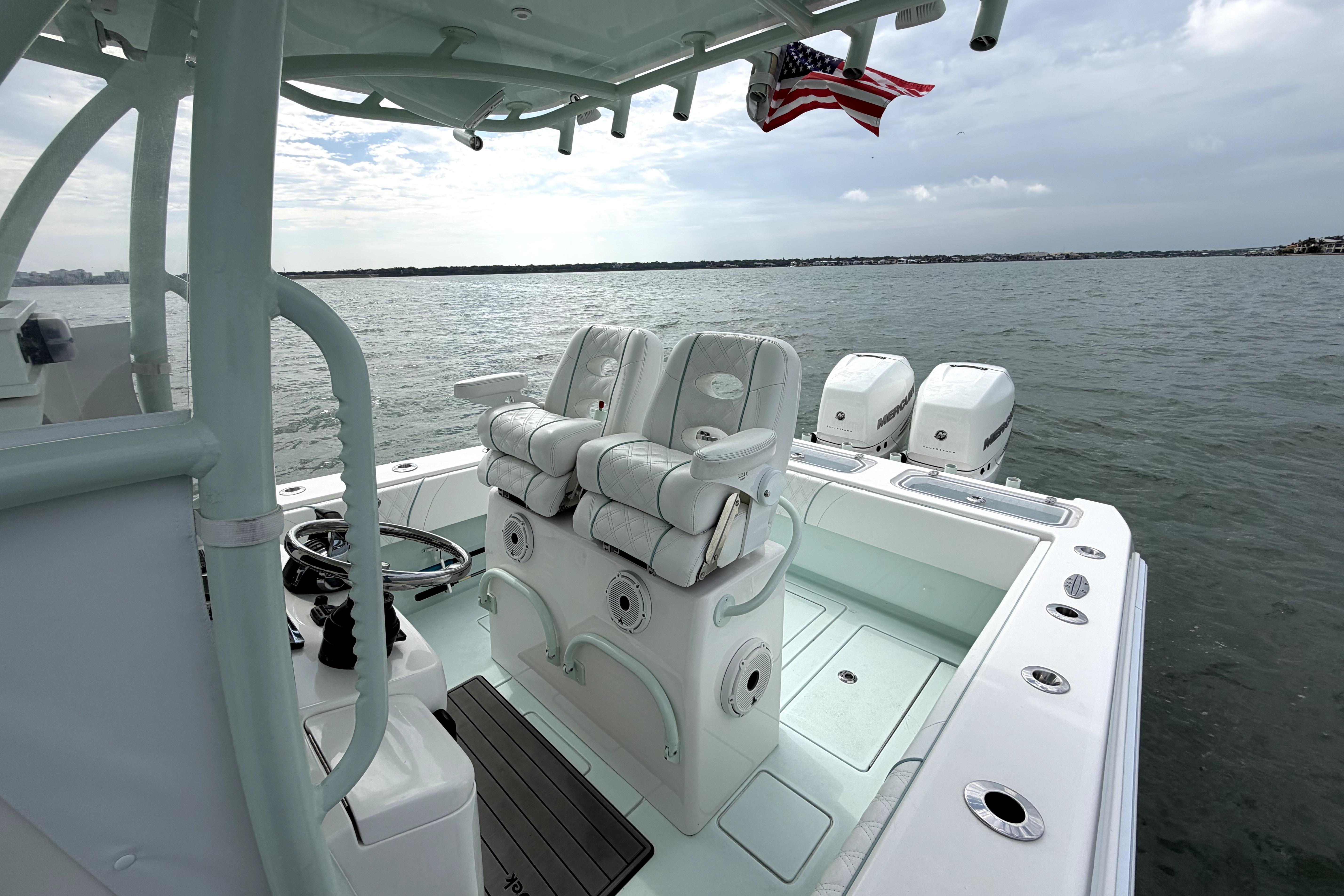 2019 Contender 30 ST boat interior with triple engines on open water.
