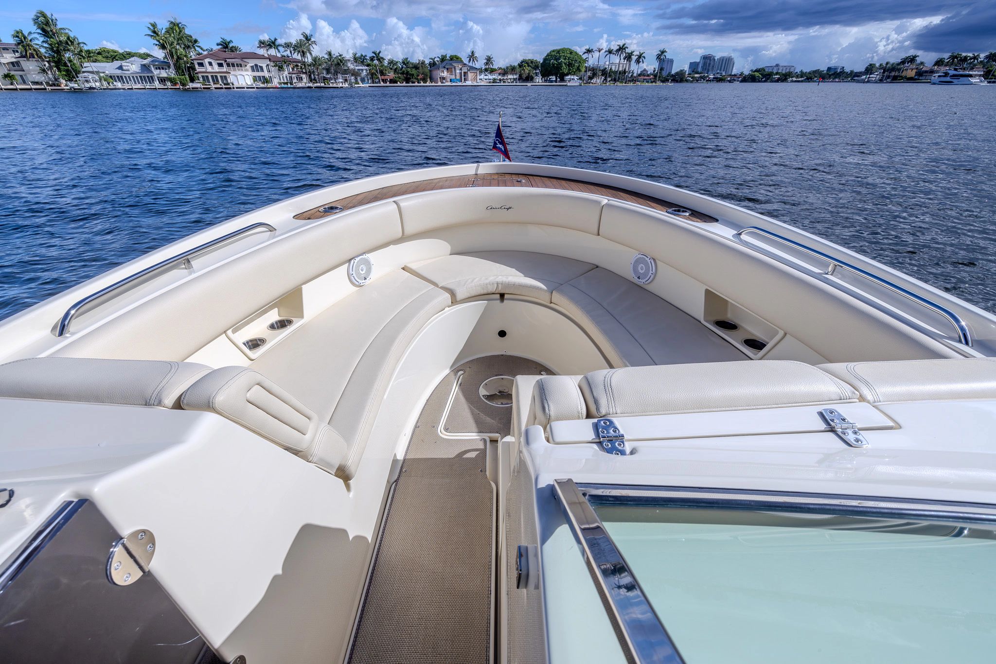 2019 Chris-Craft Calypso 30 boat with luxurious interior on calm waters.