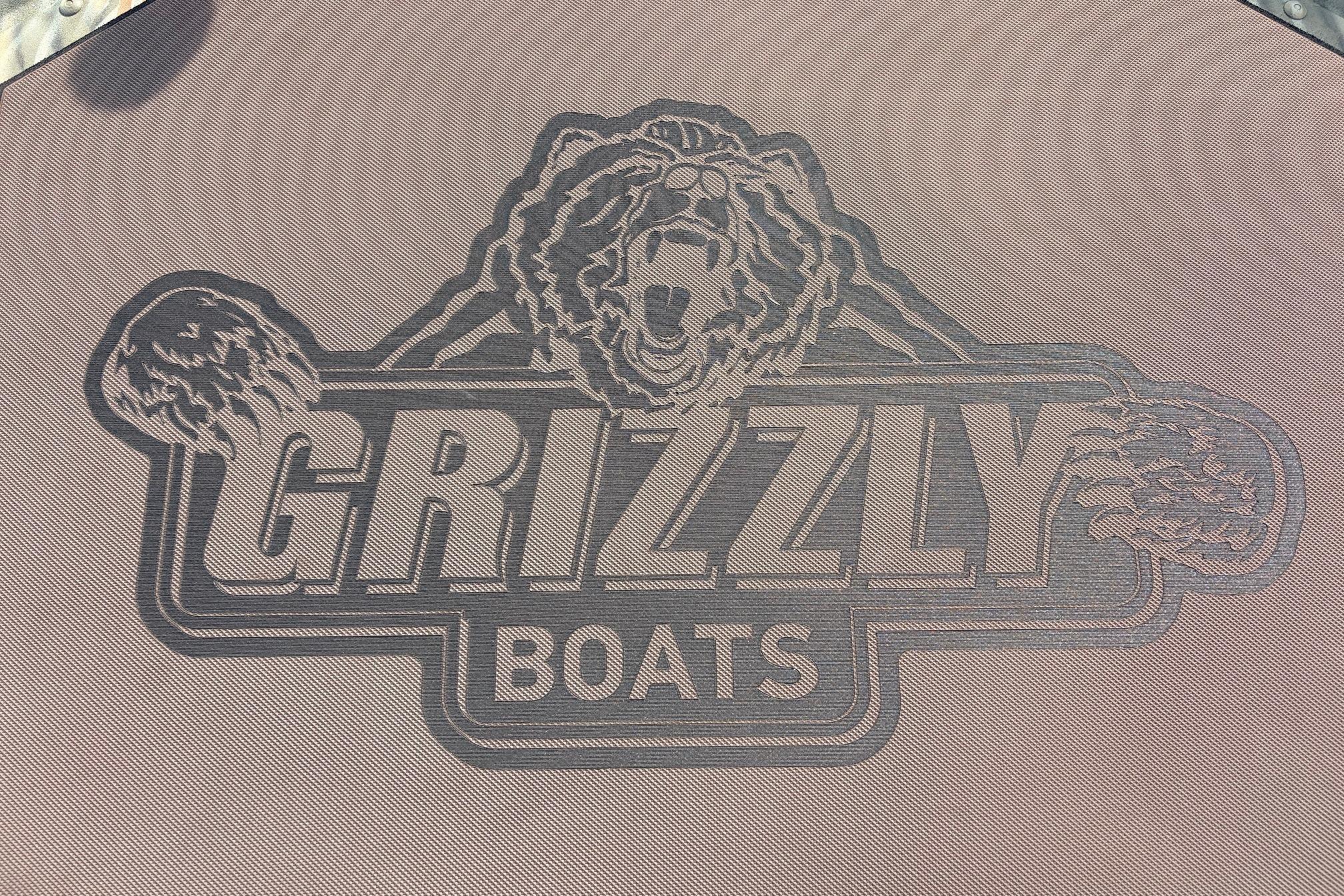 Logo of Grizzly Boats featuring a bear design on a Tracker Grizzly 1754 SC, 2026 model.