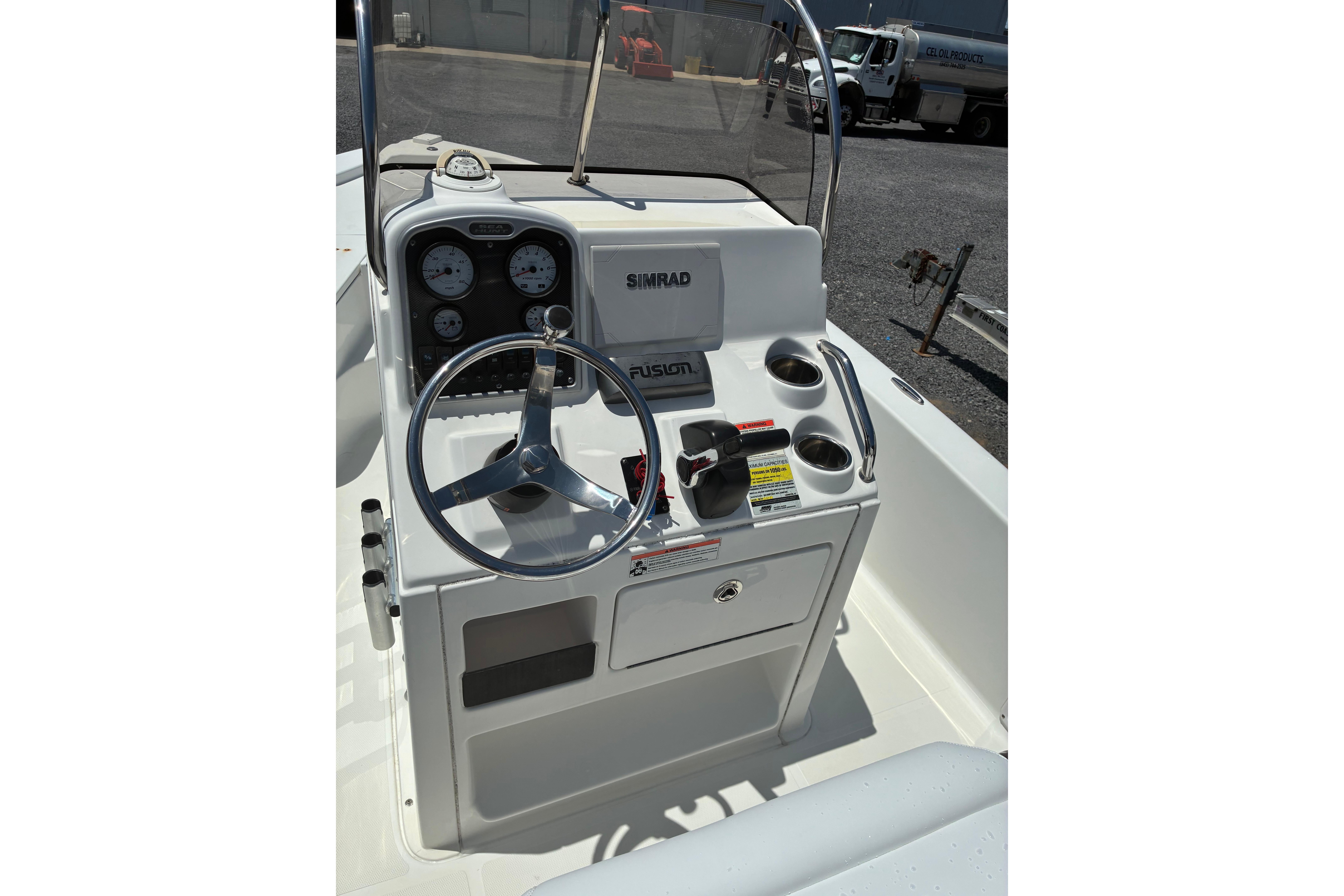 2014 Sea Hunt BX 20 BR boat console with steering wheel and gauges.