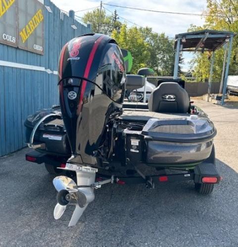 2025 Nitro Z18 Pro boat with powerful outboard motor, parked outdoors.