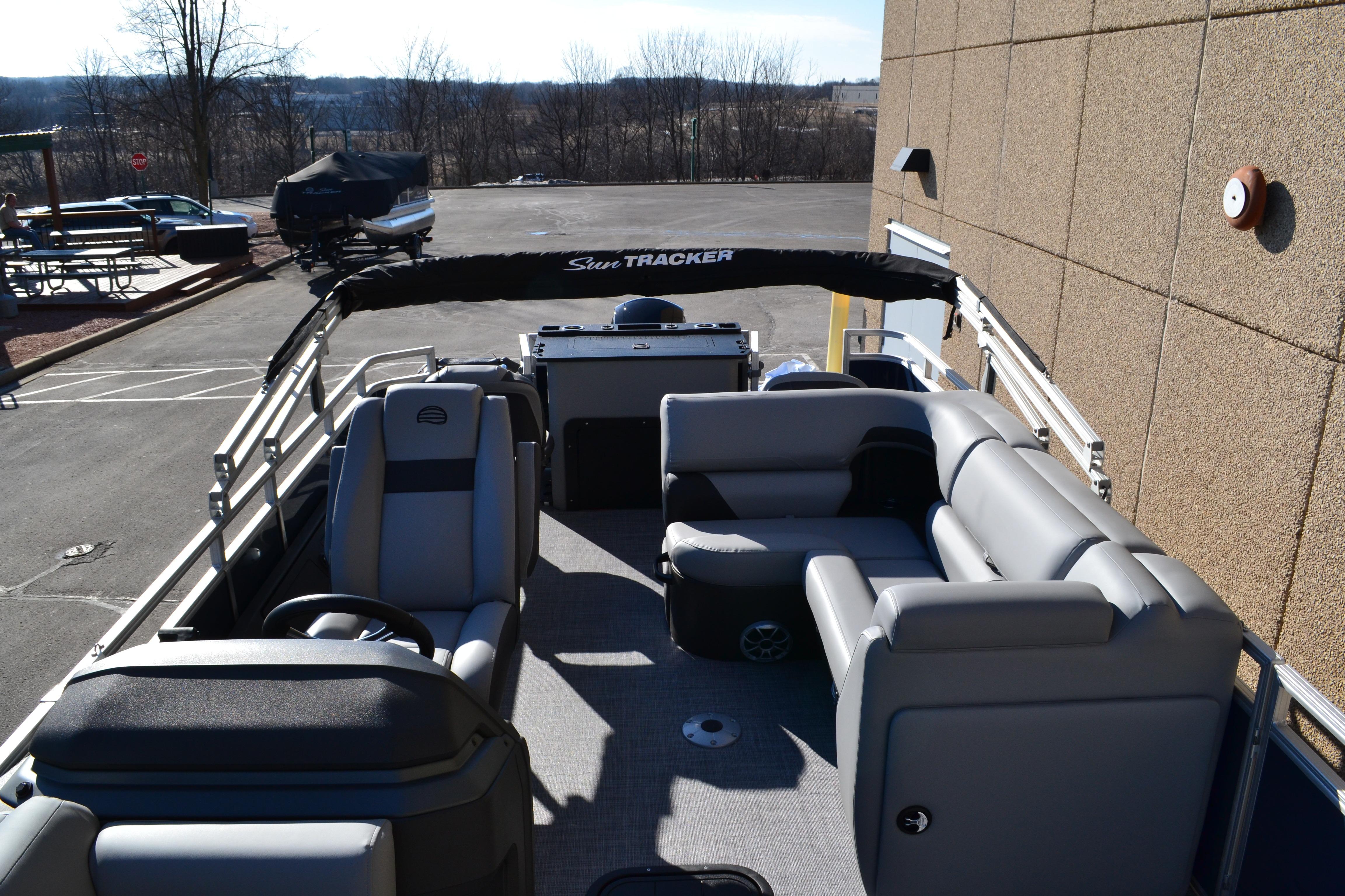 2026 Sun Tracker SportFish 22 XP3 pontoon boat with spacious seating and modern design.