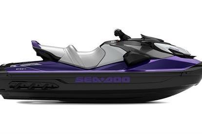 2025 Sea-Doo GTI SE 130 jet ski in sleek purple and black design.