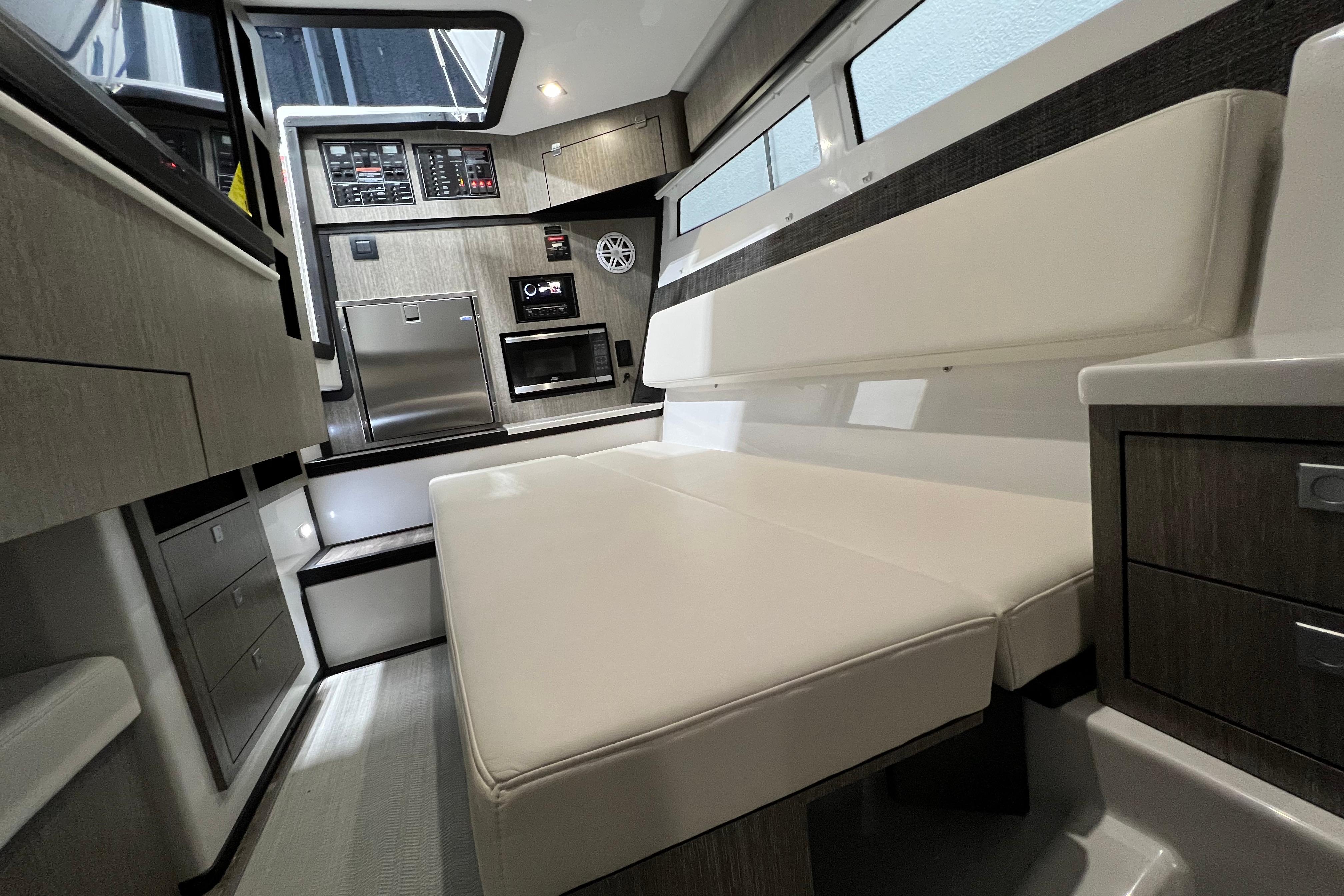 Interior of 2023 Monterey 378SS Super Sport boat with modern seating and control panel.