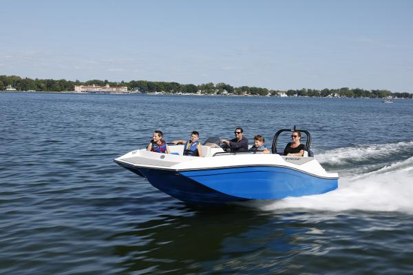 2025 Starcraft SV 16 OB boat cruising on a lake with passengers enjoying the ride.