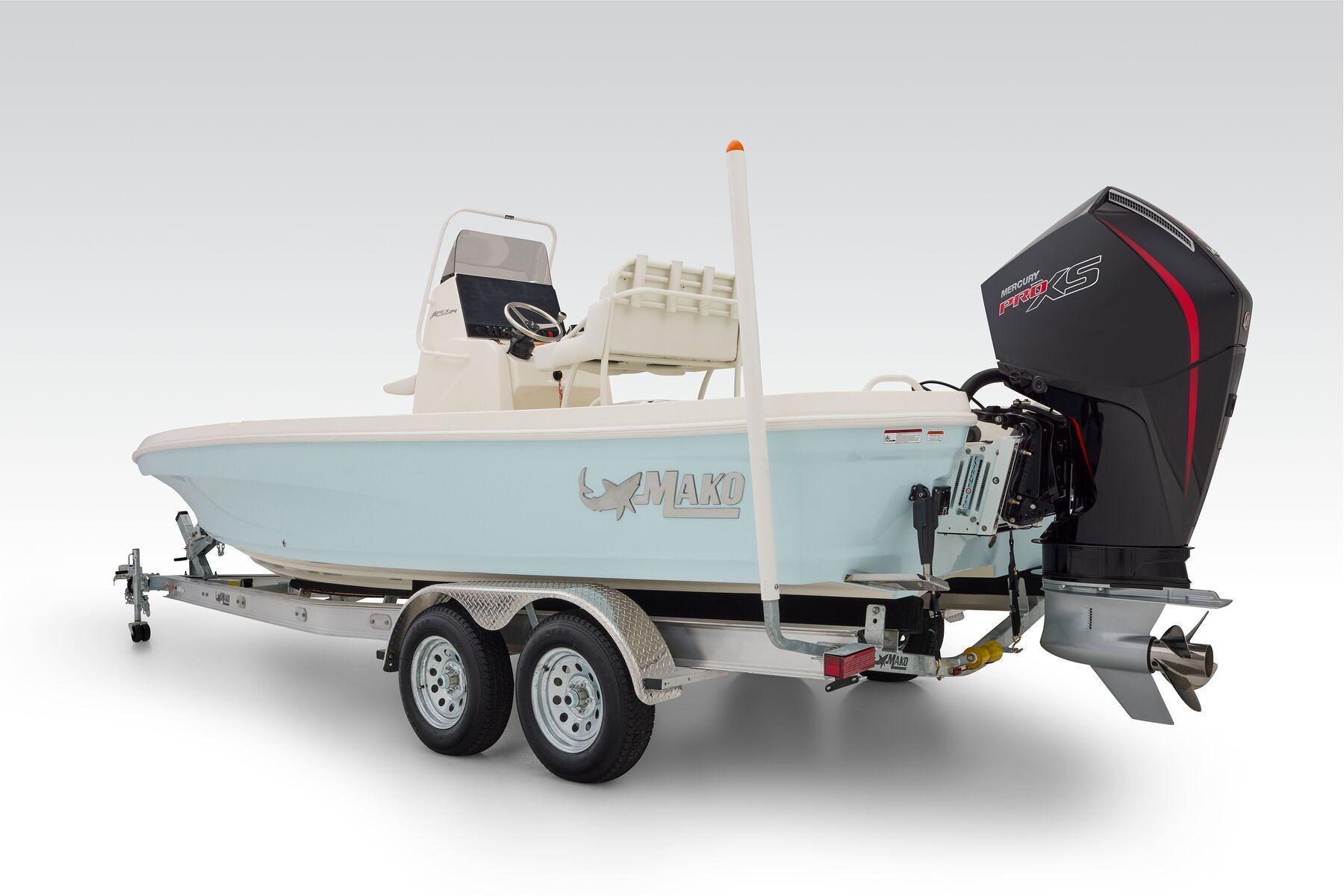 2026 Mako 24 APEX boat on trailer with Mercury Pro XS engine.
