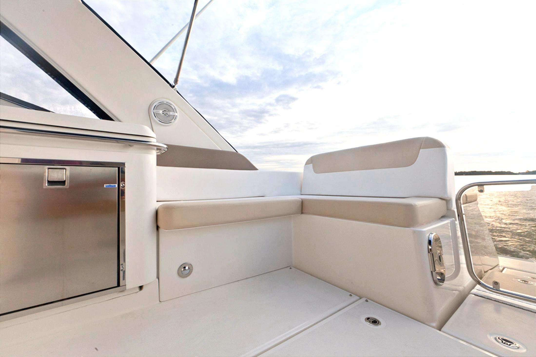 Manufacturer Provided Image: 2013 Sea Ray 370 Venture boat deck with seating and storage.