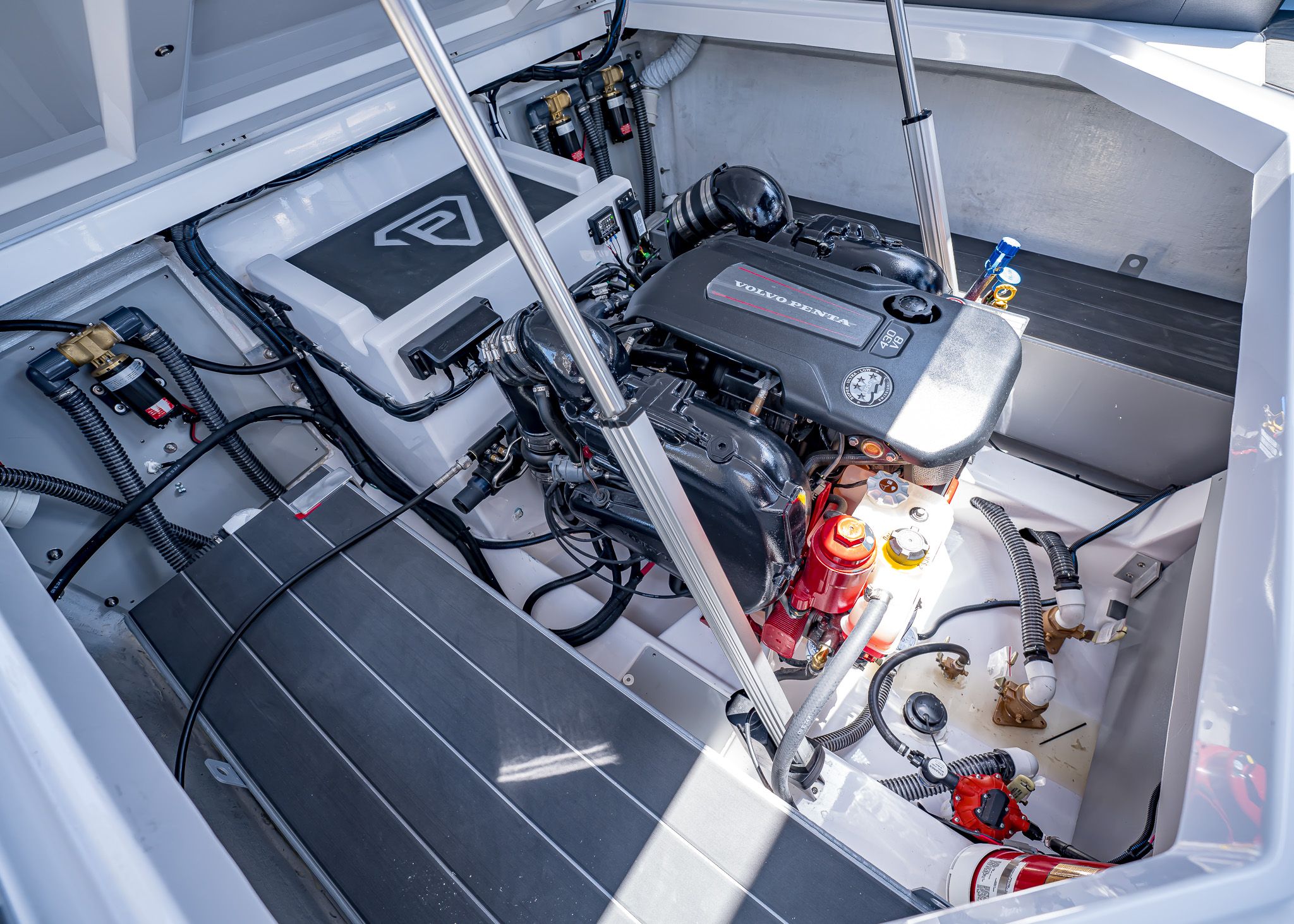 Engine compartment of 2025 Paradigm 266 SL SURF with Volvo Penta engine.