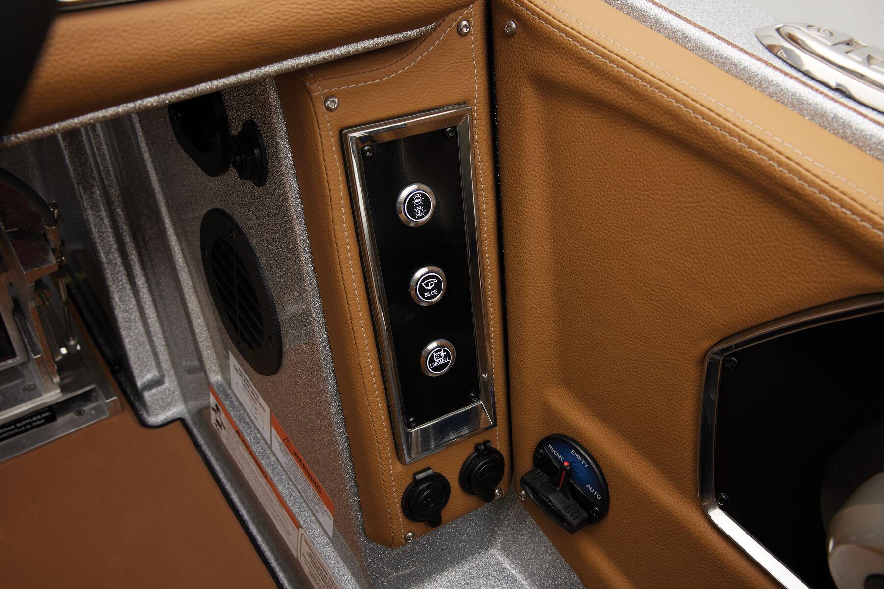 Manufacturer Provided Image: 2026 Ranger Z520R Ultra boat interior control panel with leather trim.