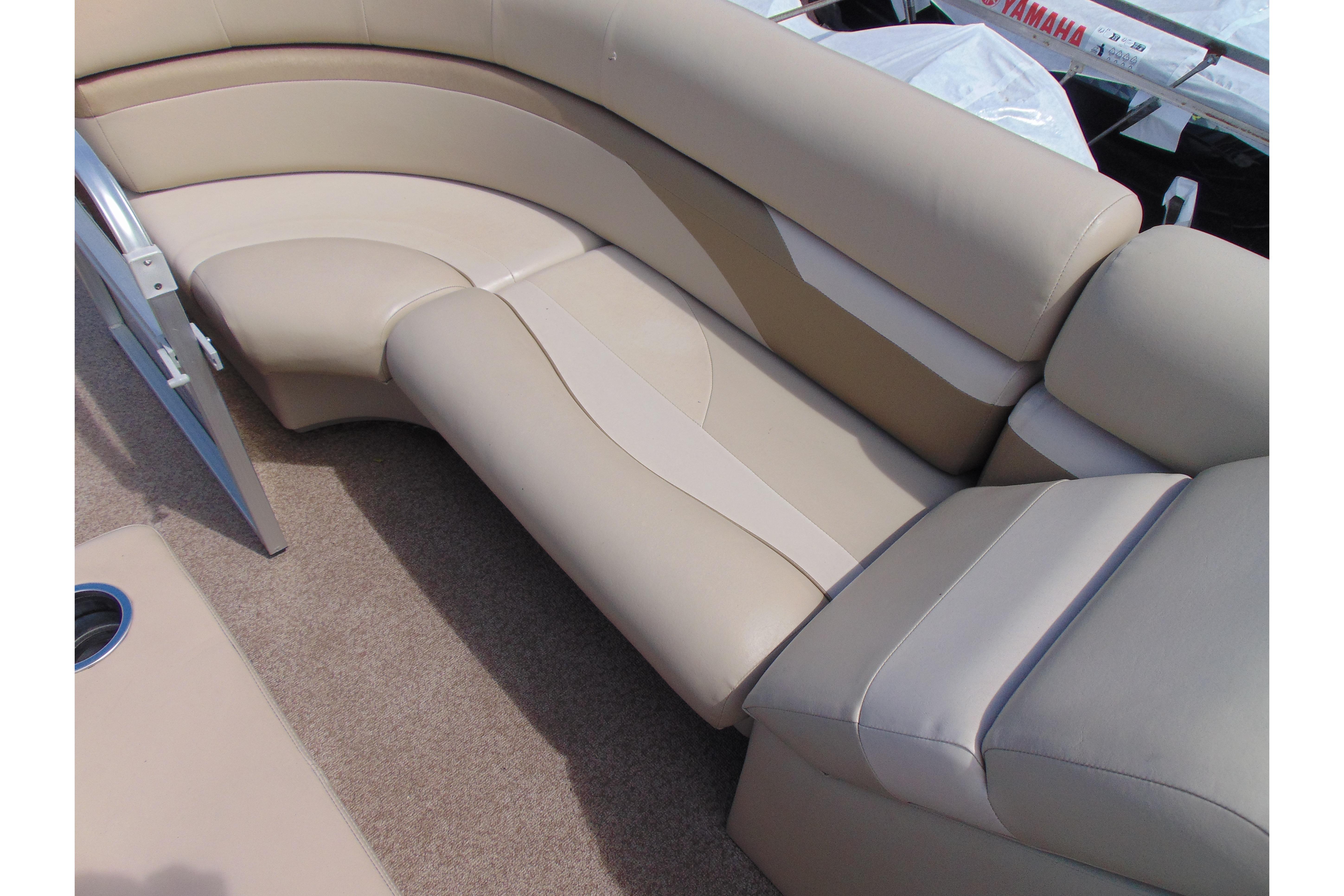 Beige seating area on 2016 Misty Harbor 245 Adventure CU boat.