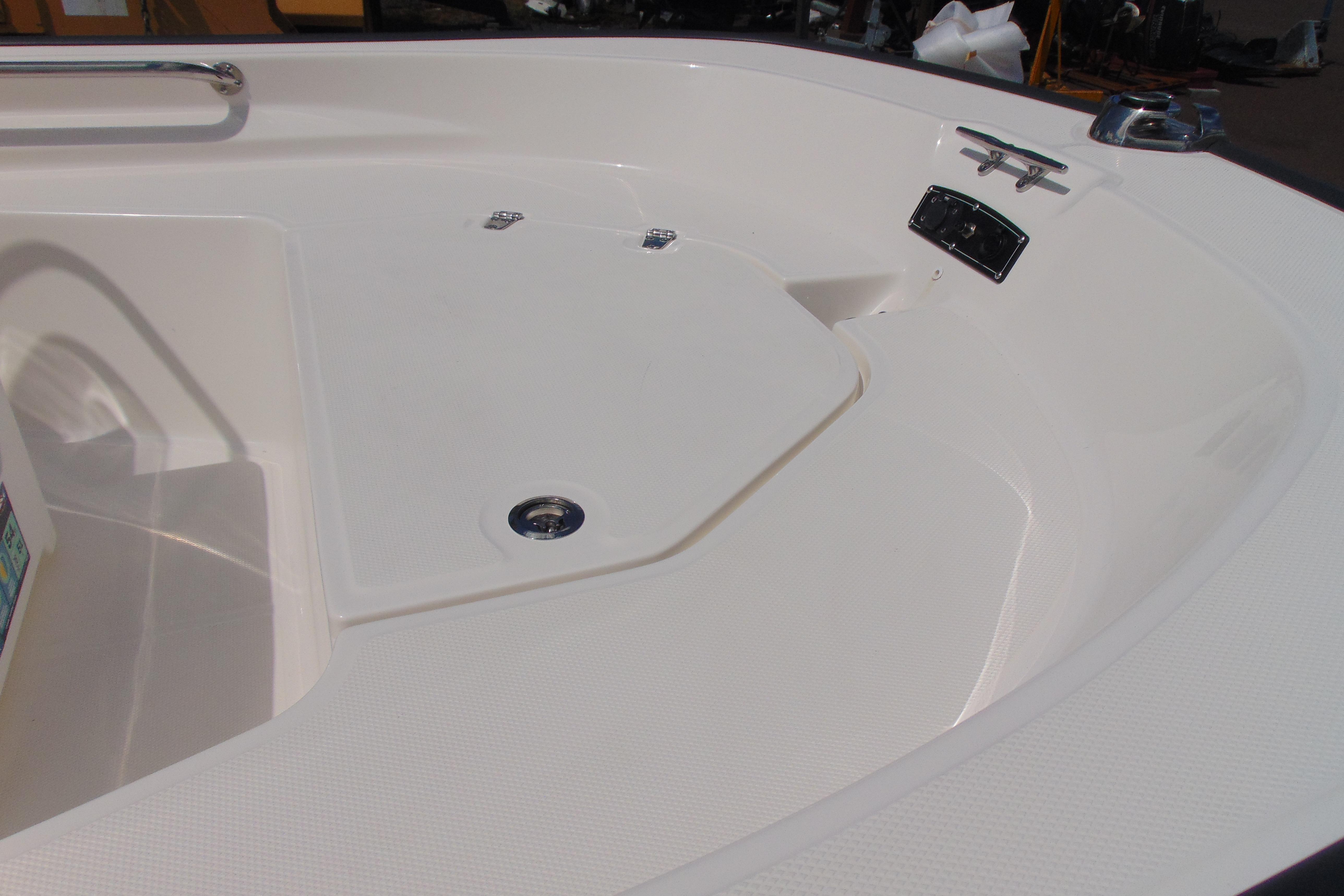 2026 Boston Whaler 150 Montauk boat interior, featuring sleek white deck design.