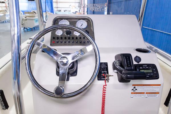 Manufacturer Provided Image: 2026 Carolina Skiff 23 LS boat console with steering wheel and control panel.
