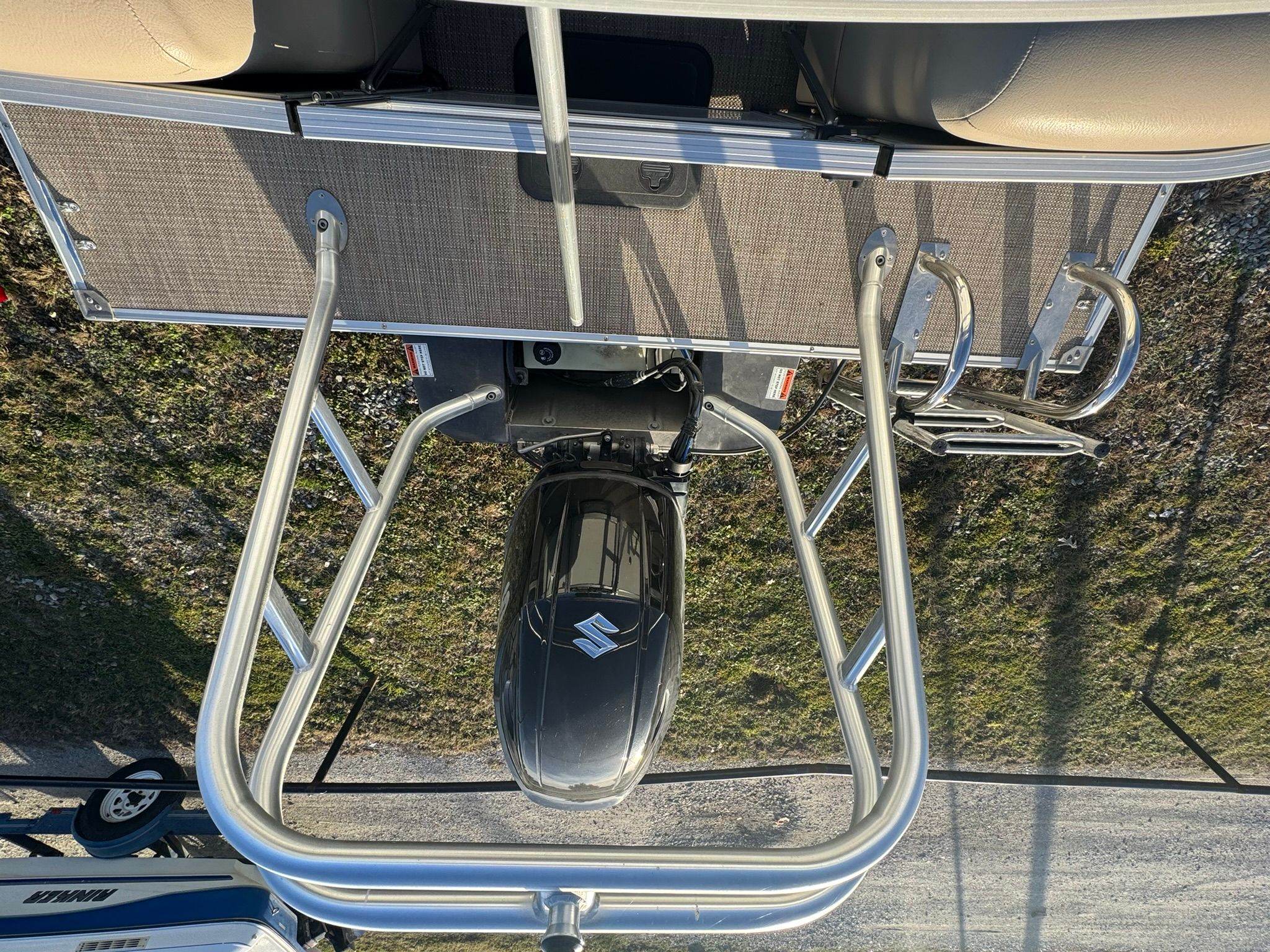 2024 Landau Island Breeze 252 with Suzuki engine, aerial view.