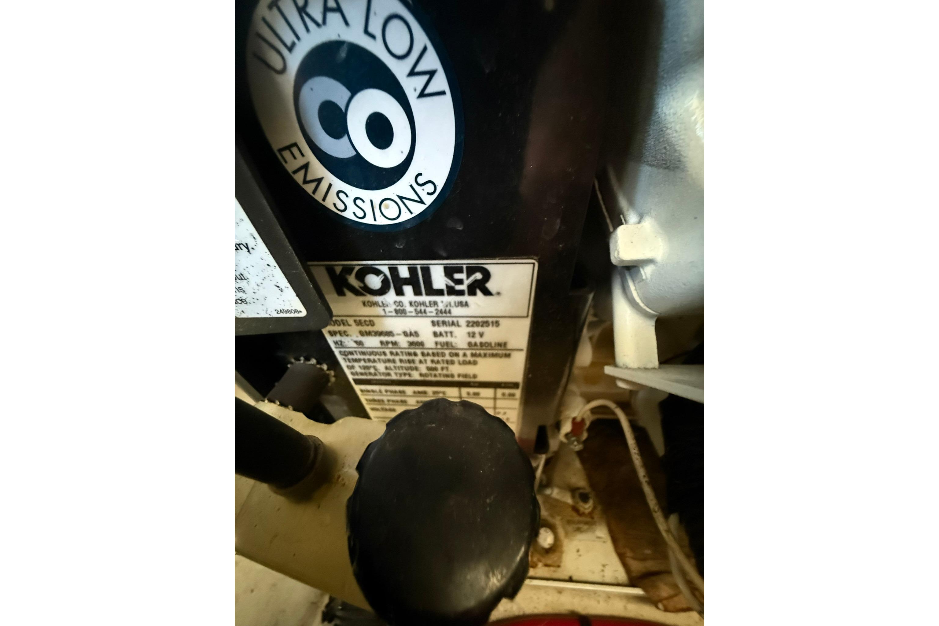 Kohler engine label on 2009 Sea Ray 350 Sundancer, featuring ultra-low emissions.