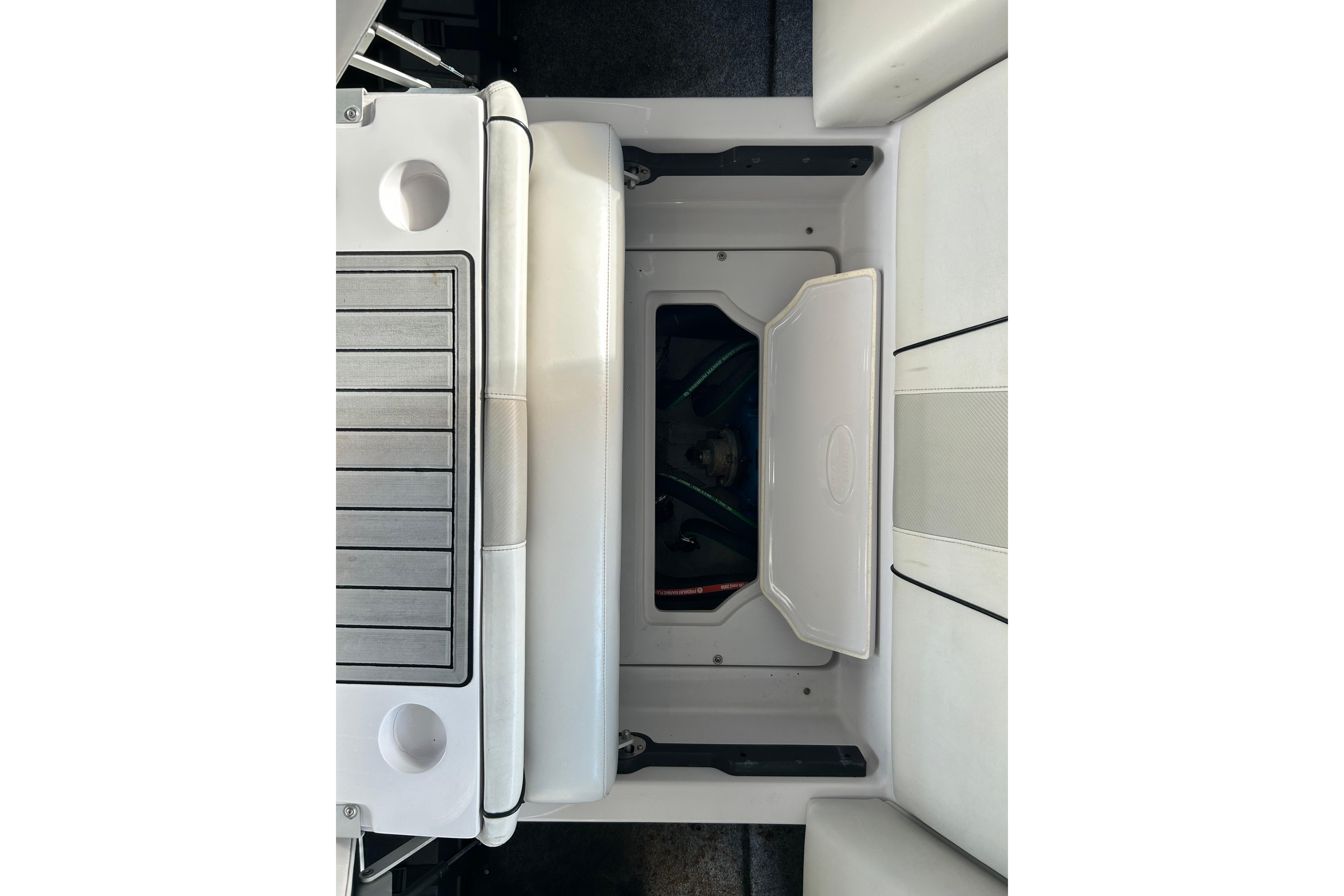 2010 Nautique Super Air Nautique 210 Coastal Edition interior storage compartment.