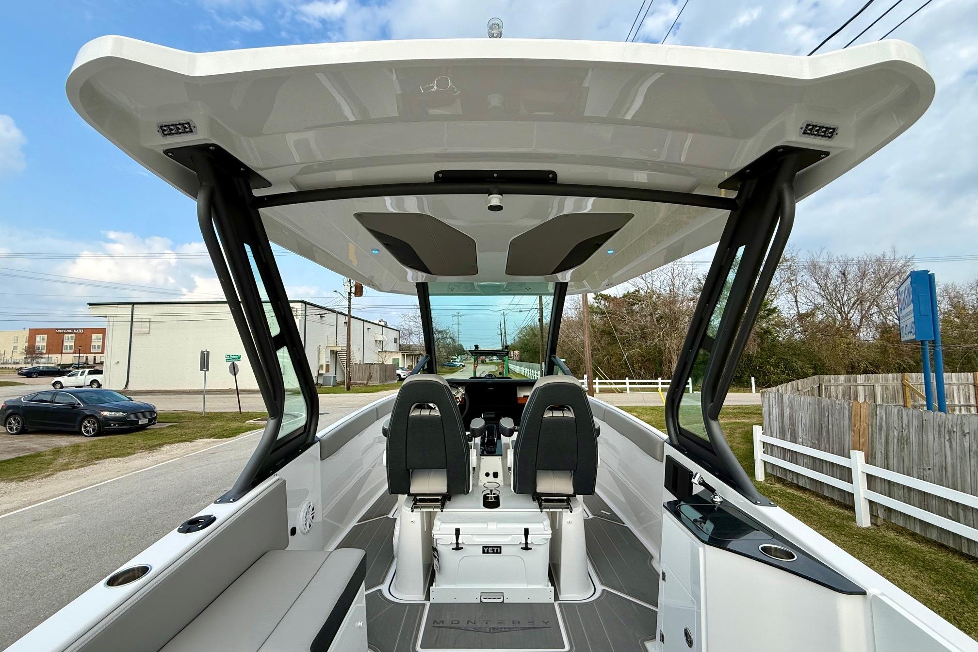 2026 Monterey Elite 25 OB boat interior with modern seating and sleek design.