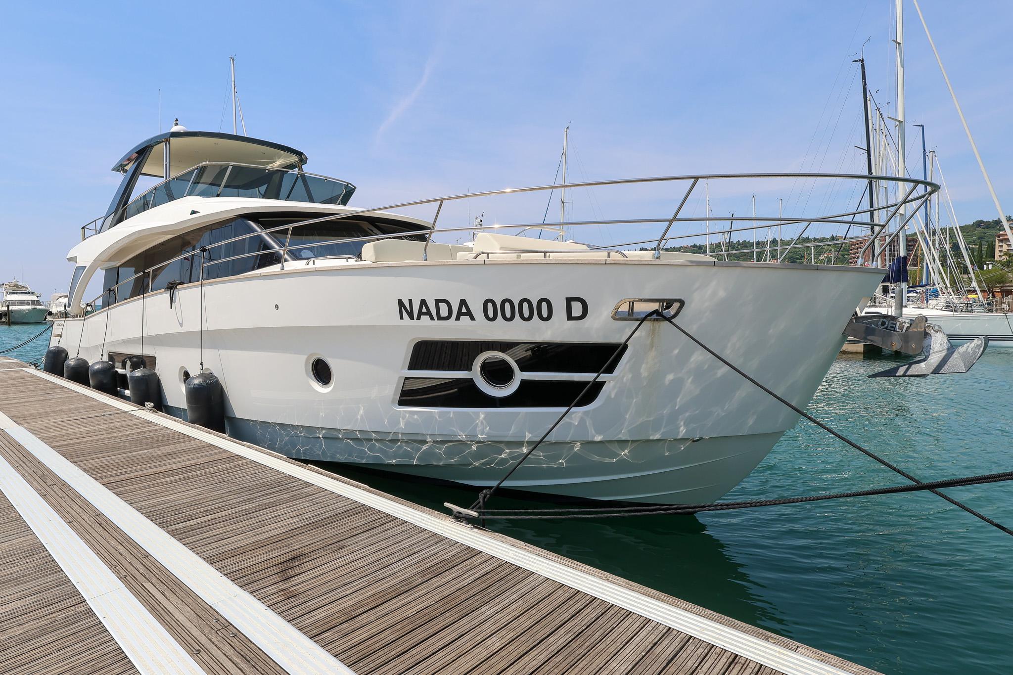 2021 Greenline OceanClass 68 yacht docked at marina.