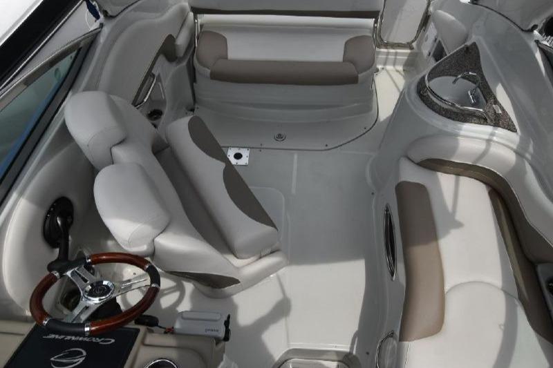 2021 Crownline 264 CR boat interior with seating and steering wheel.