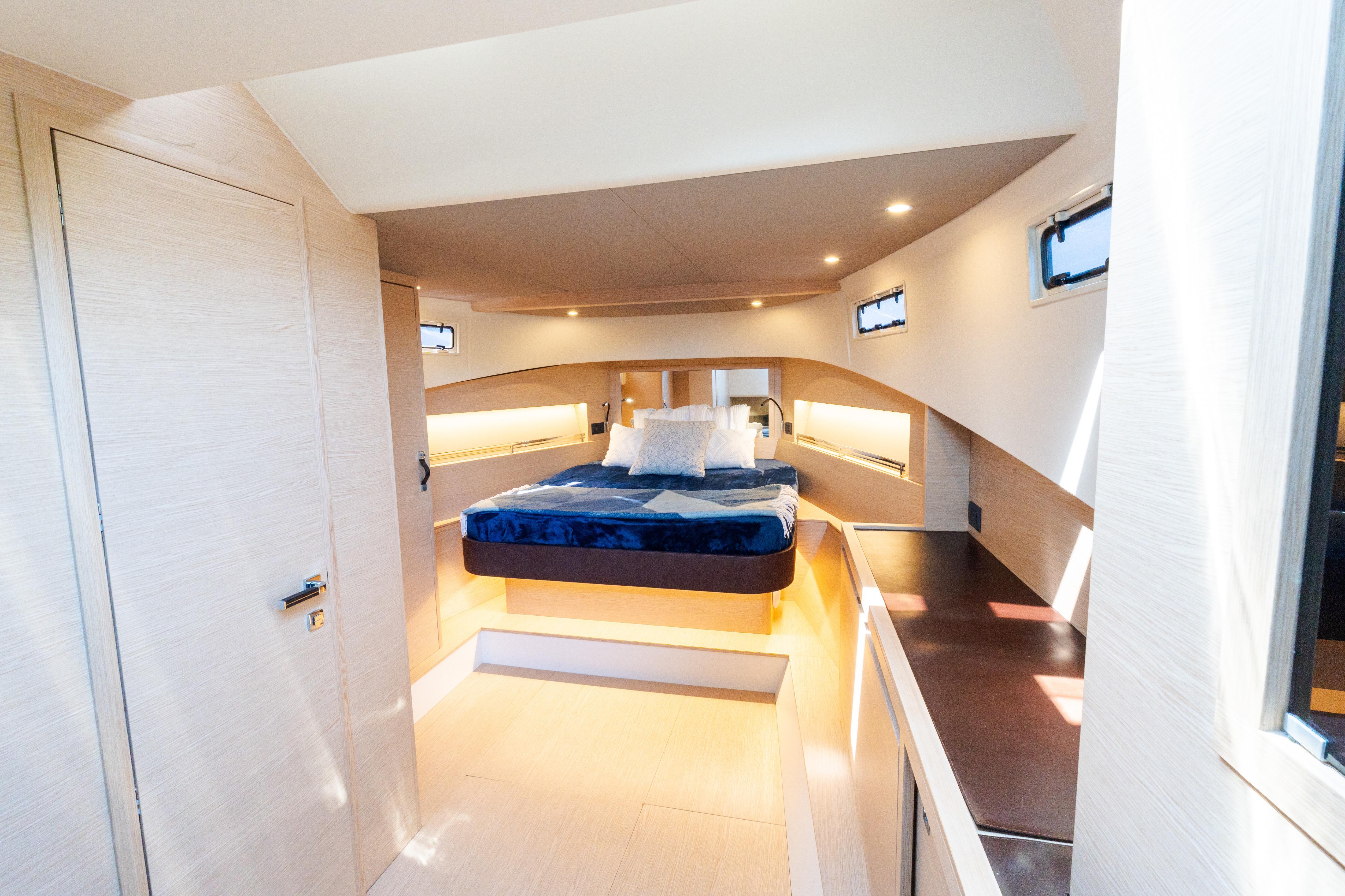 Luxurious interior of 2023 Solaris Power 44 Open yacht, featuring a modern bedroom design.