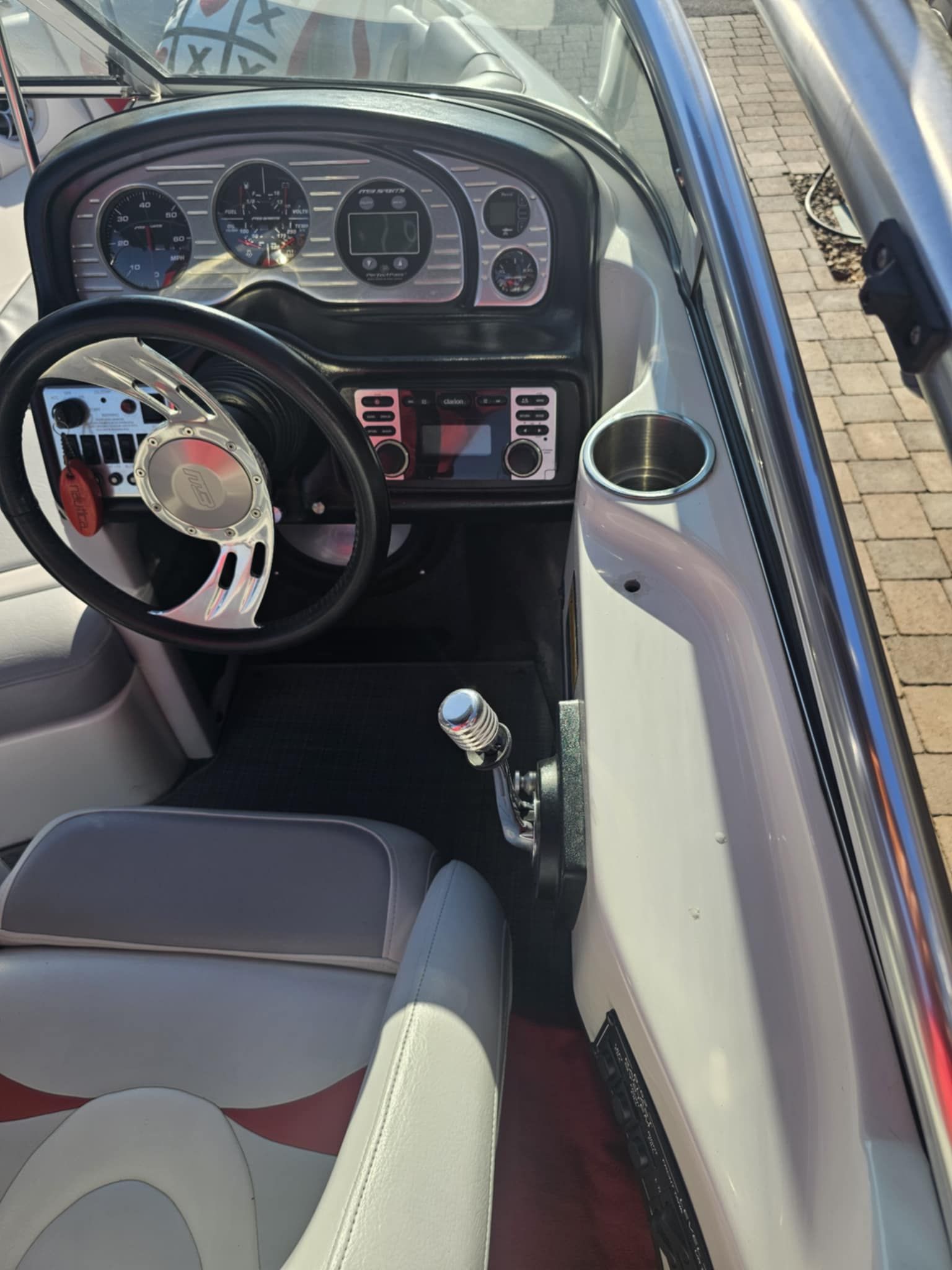 Interior of a 2006 MB PIGPR with steering wheel and dashboard.