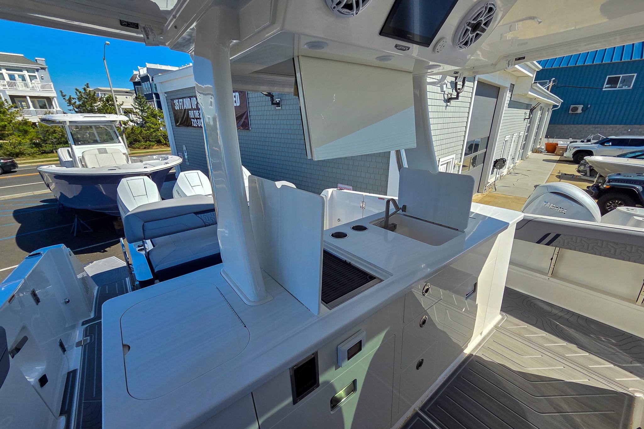 2026 Regal 38 SAV boat interior with modern kitchen amenities and sleek design.