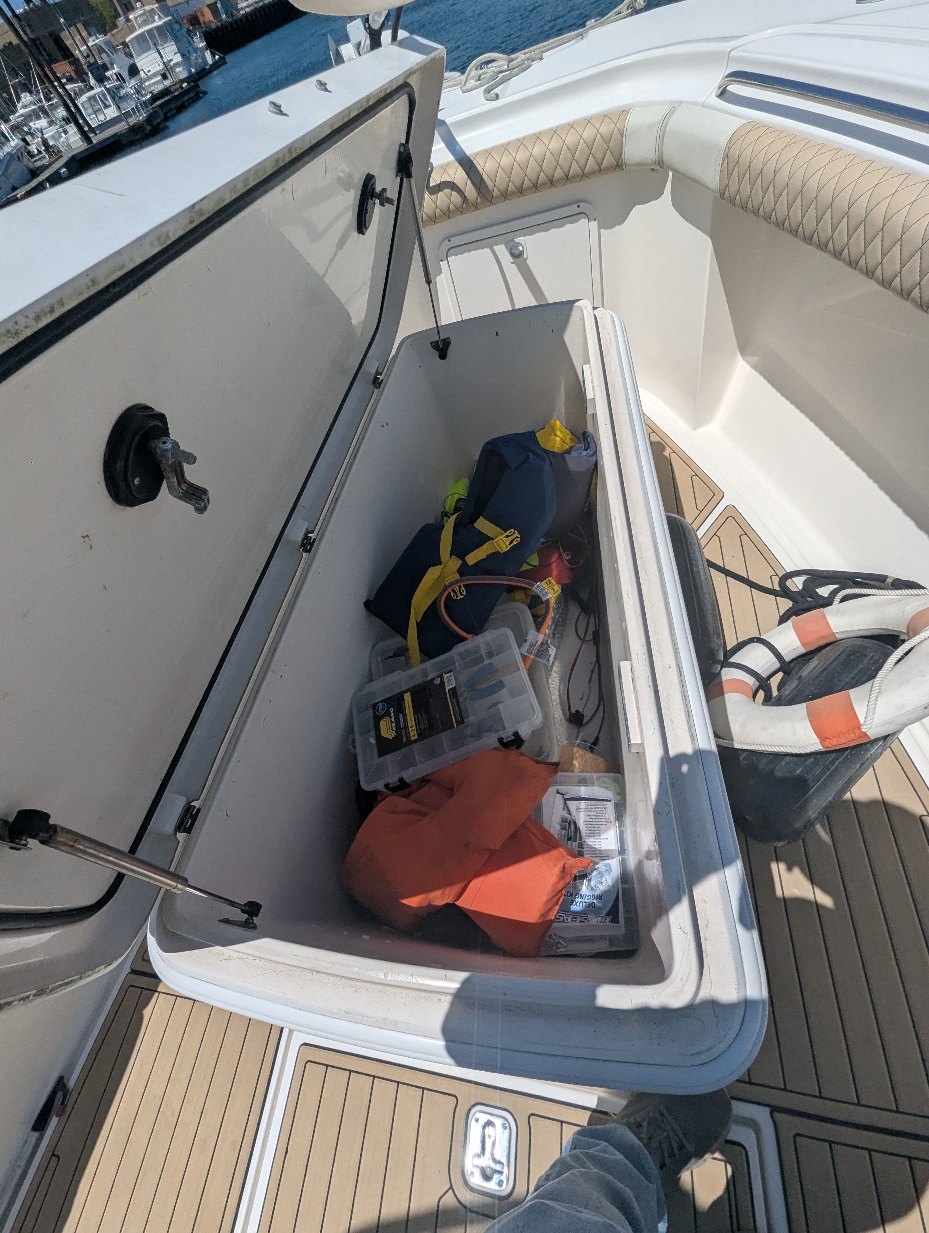 Open storage compartment on a 2005 Wellcraft 35 CCF boat.