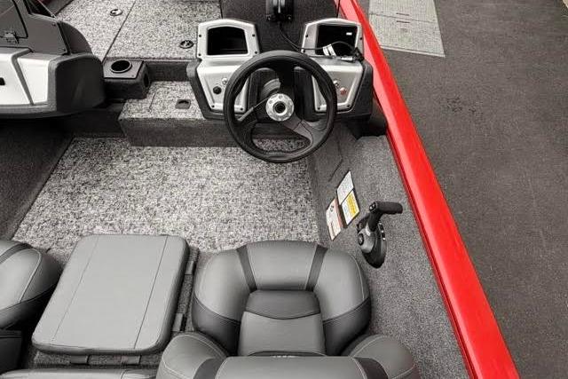 2026 Tracker Pro Team 175 boat interior with steering wheel and seating.