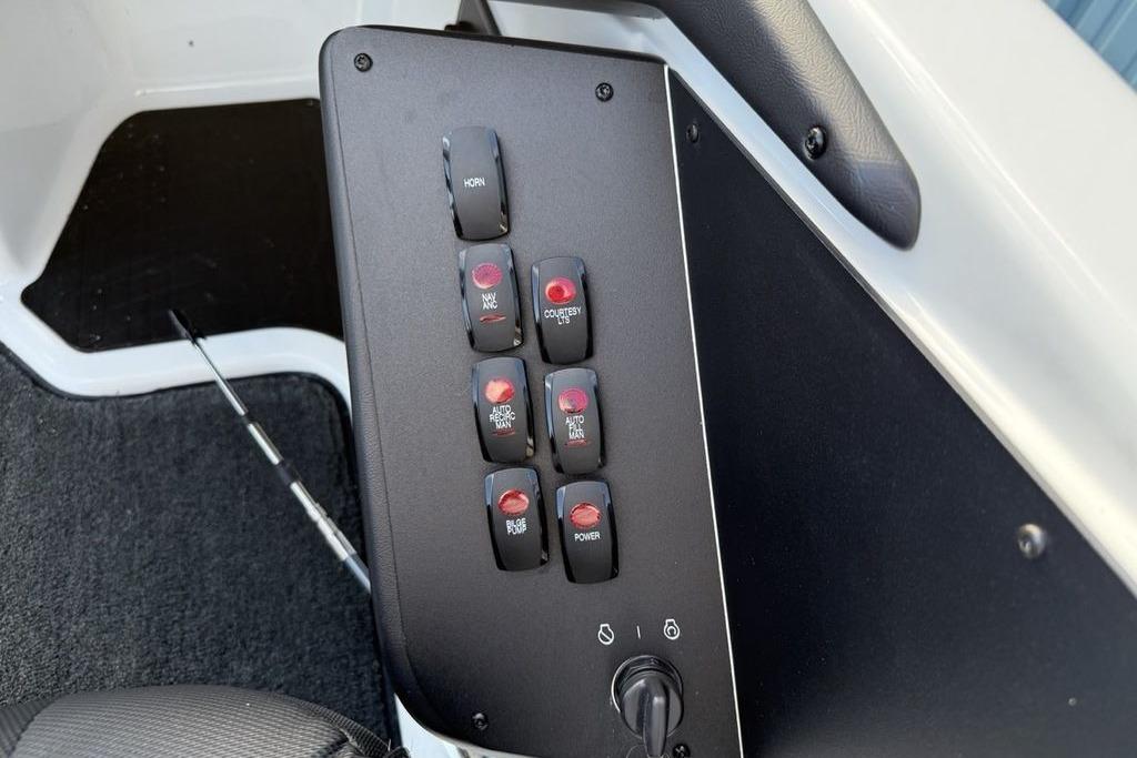 Control panel of 2026 Skeeter ZXR19 SE boat with labeled switches.