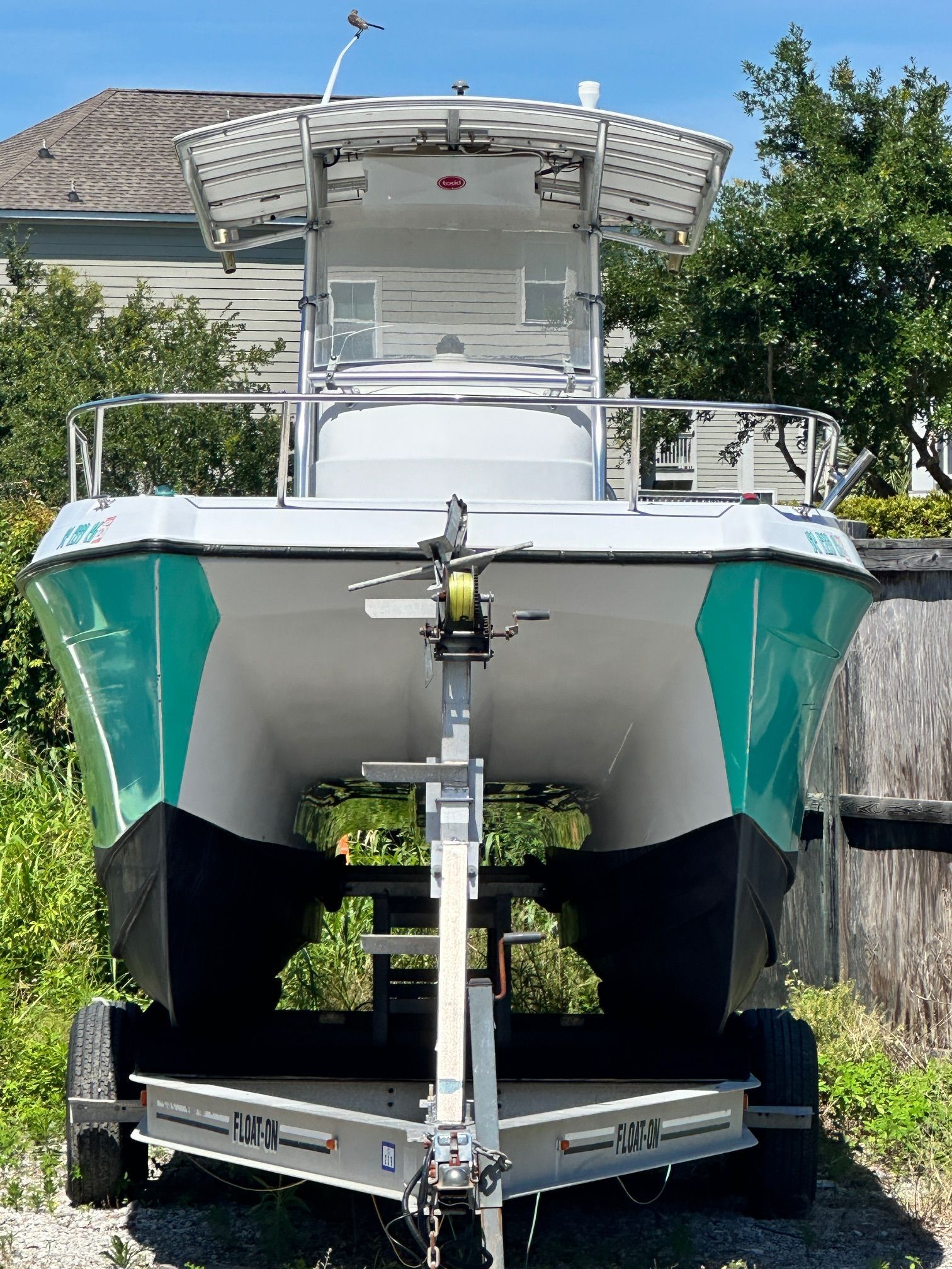 1999 Glacier Bay 260 Canyon Runner on trailer, front view.