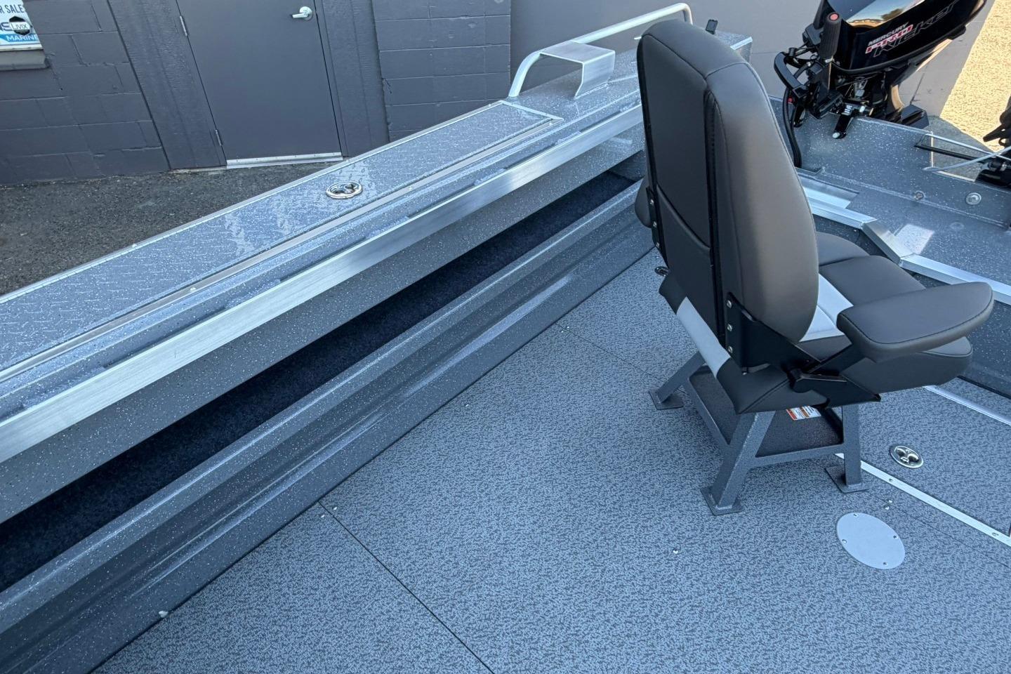 2026 Thunder Jet 209 Rush OT boat interior with seating and storage compartments.
