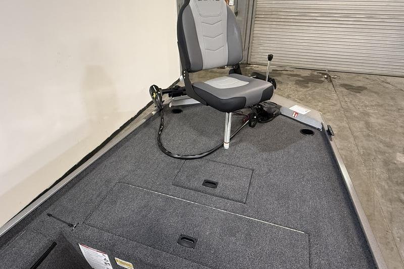 2026 Lowe Skorpion 16 boat interior with gray seating and carpeted deck.