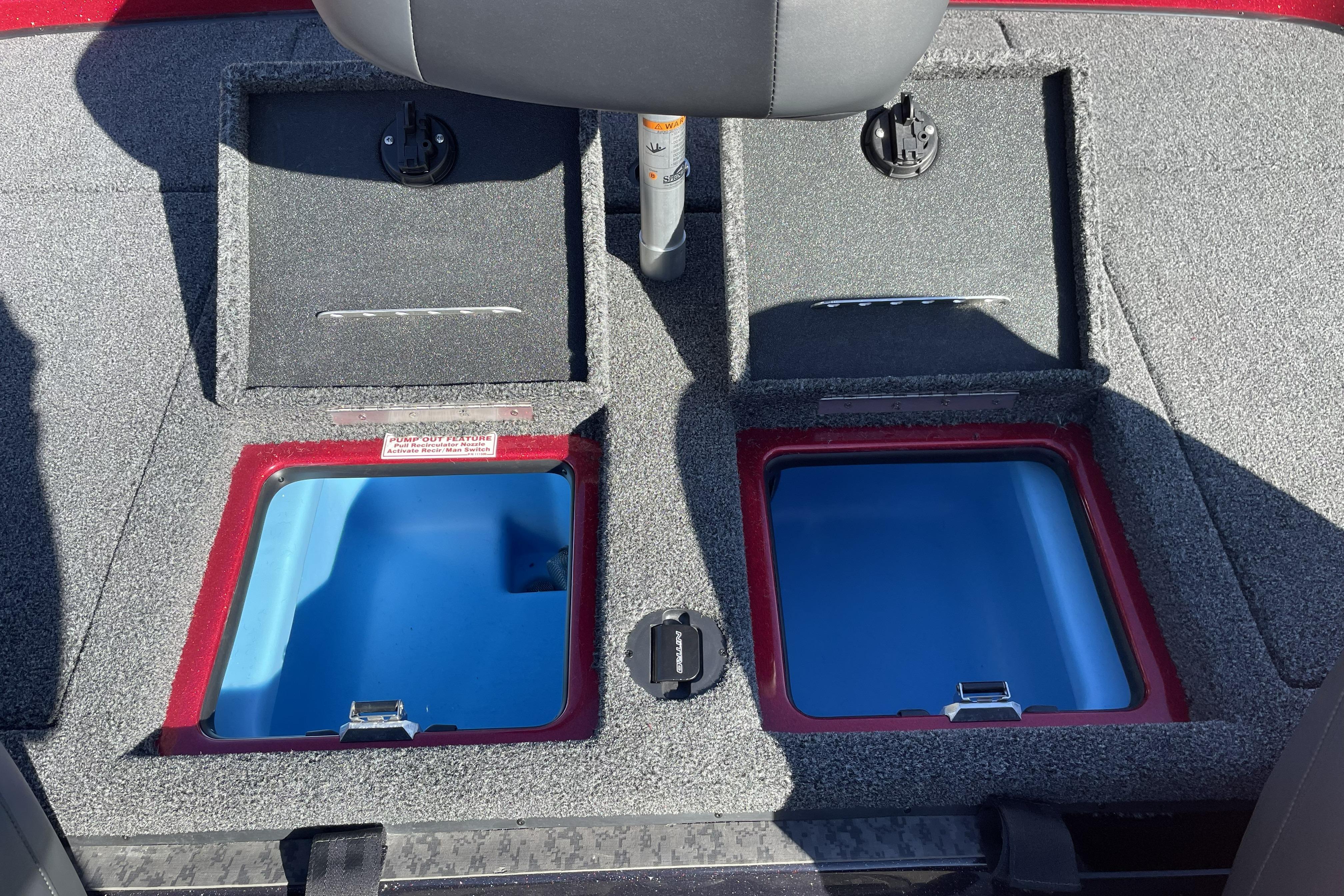 2026 Nitro Z19 XL boat storage compartments with open lids and blue interiors.