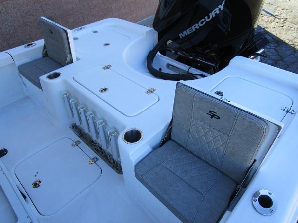 2025 Sea Pro 230 Bay boat interior with Mercury engine and seating.